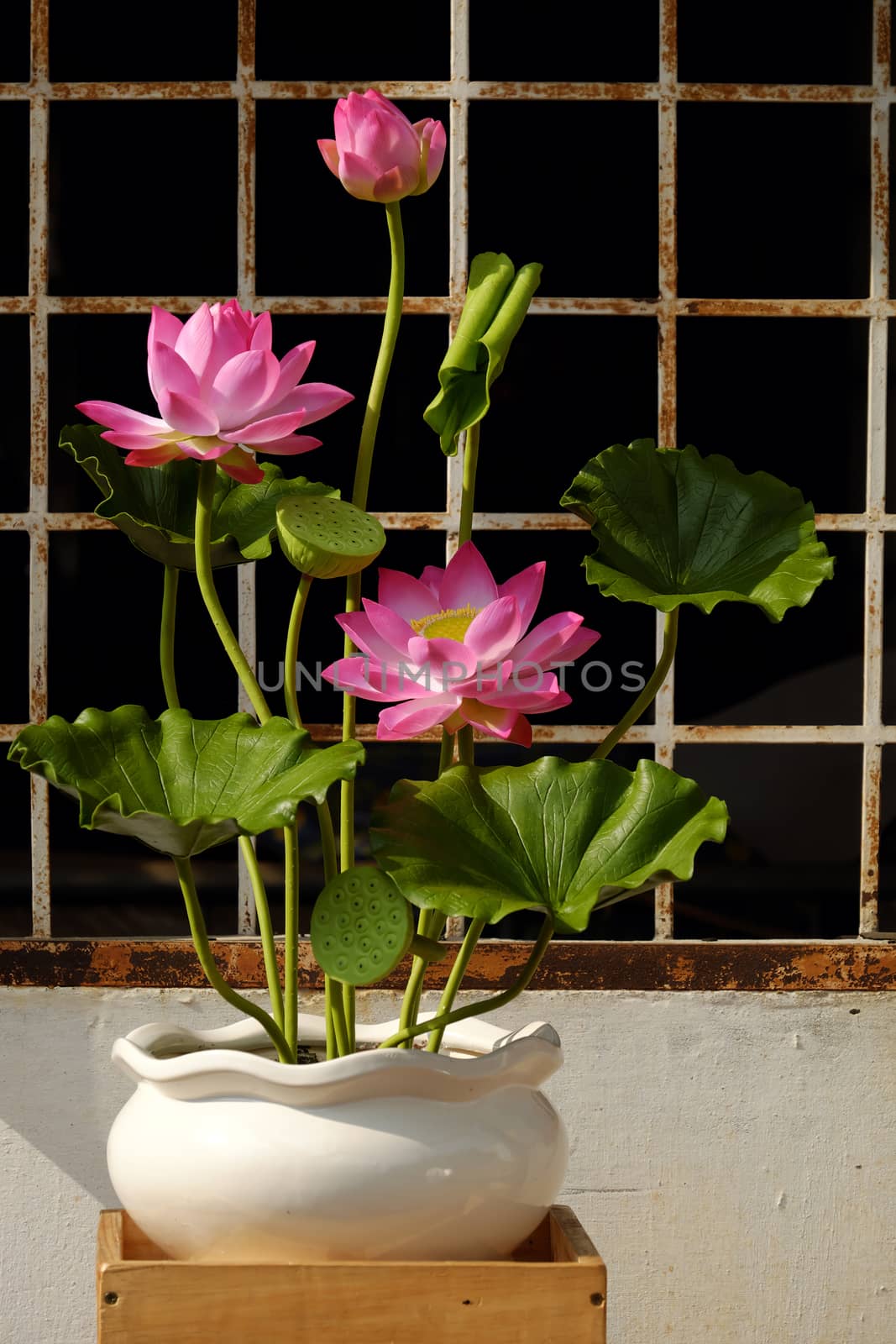 Artificial flower, handmade lotus flower with green leaf and pink petal make from clay, diy art product for home decoration