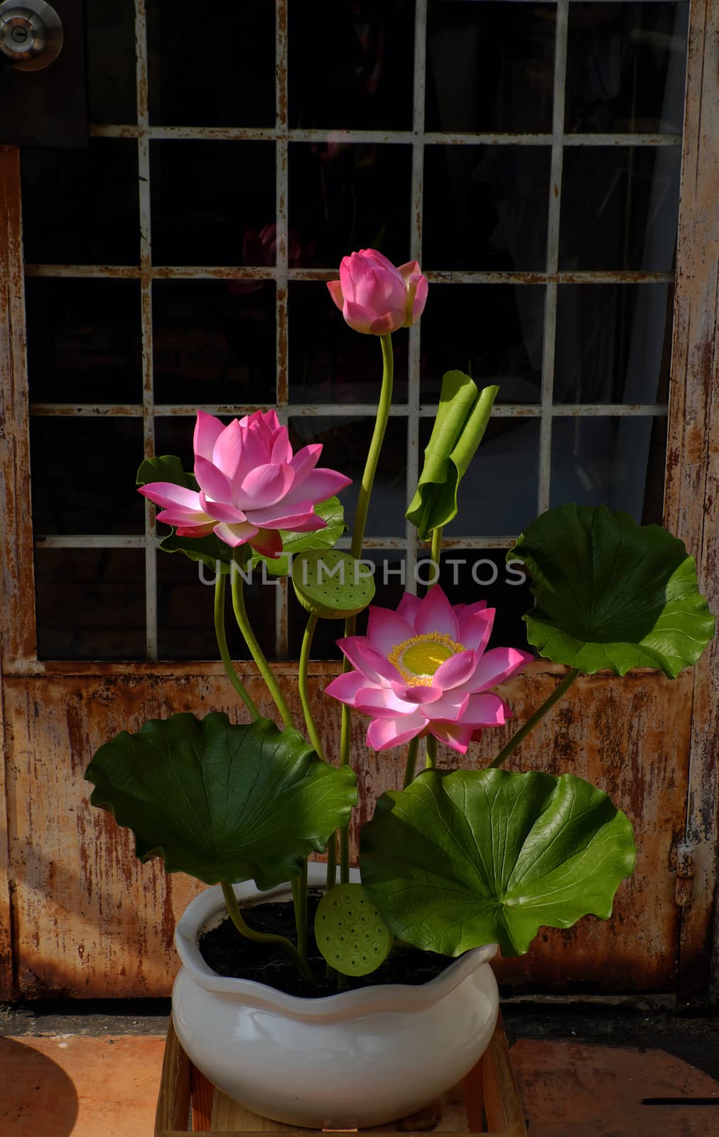 Artificial flower, handmade lotus flower with green leaf and pink petal make from clay, diy art product for home decoration