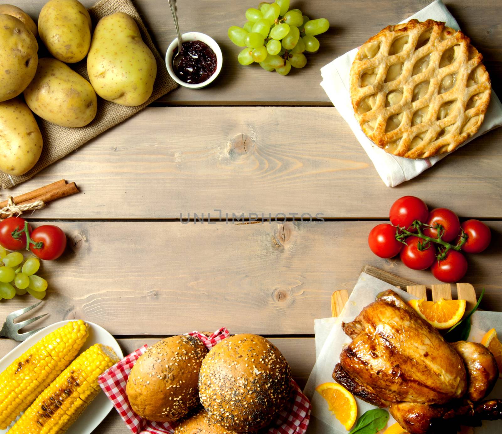 Christmas and thanksgiving food selection around a table with space