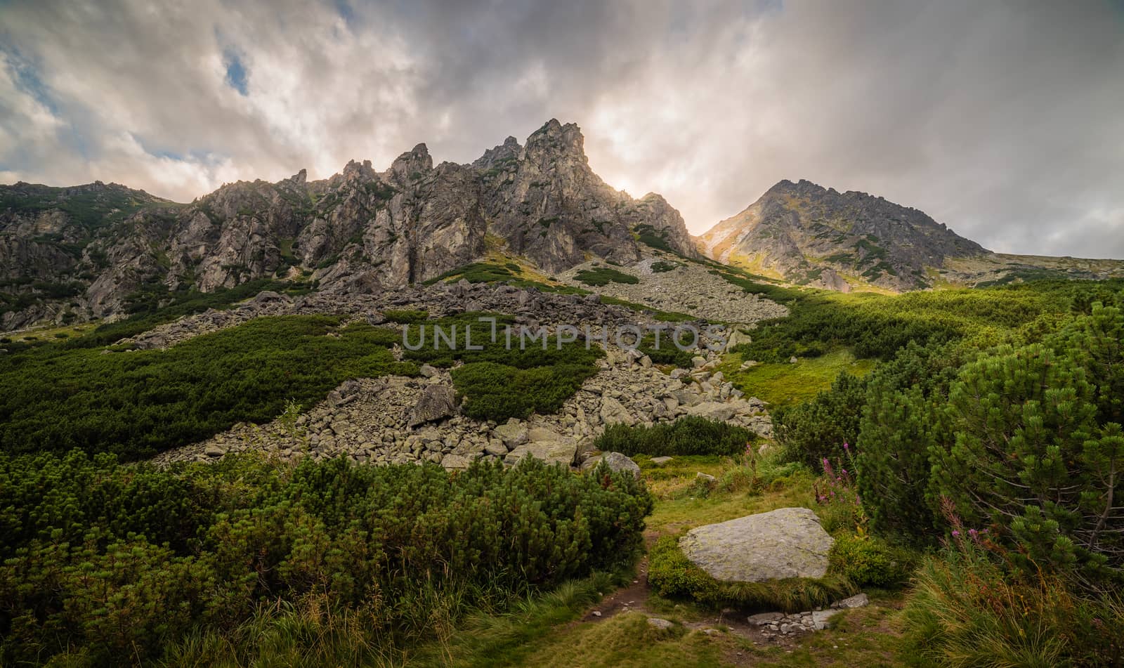 Mountain Landscape with Dramatic Glowing Sky. Mlynicka Valley, High Tatra, Slovakia.