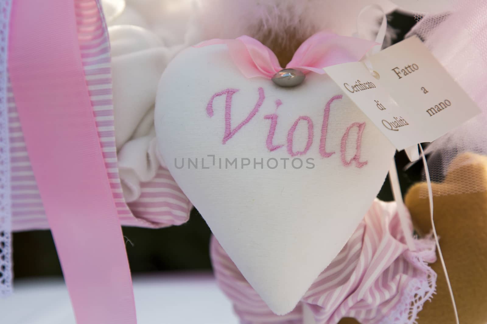 View a cloth heart with the name as a decoration