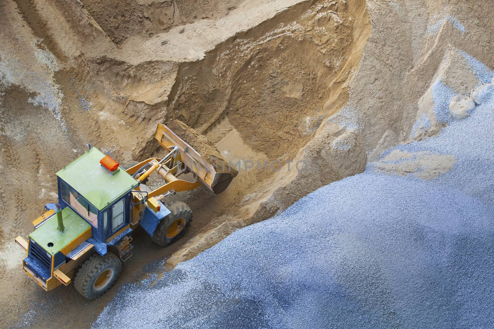 top view of heavy machine working in construction site 