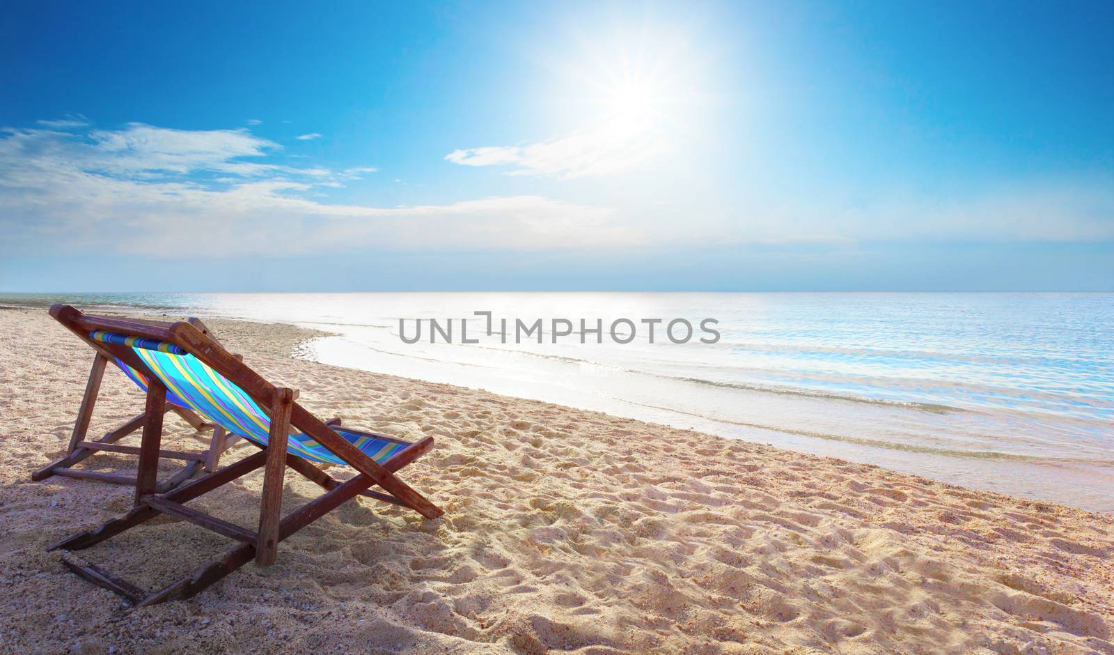couples of wood chair beach and blue sky at sea side for summer  by khunaspix