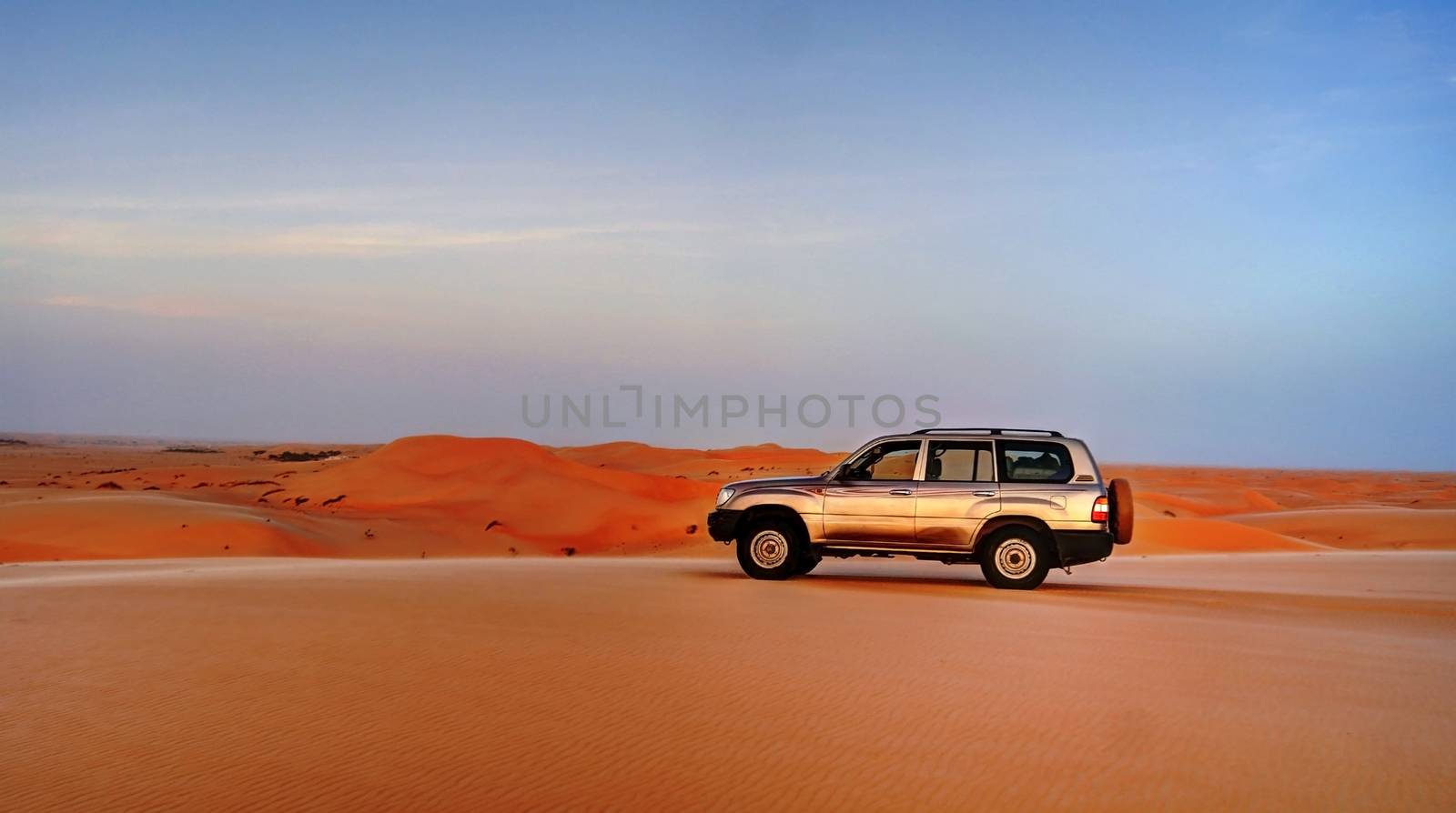 Jeep at the top of the Sahara dune