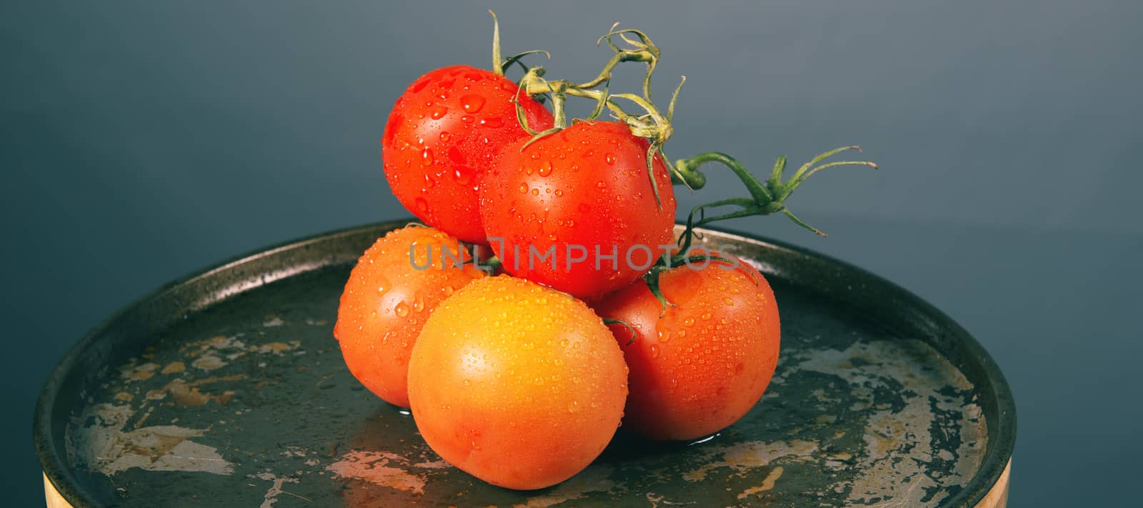 Red ripe fresh tomatoes by artistrobd
