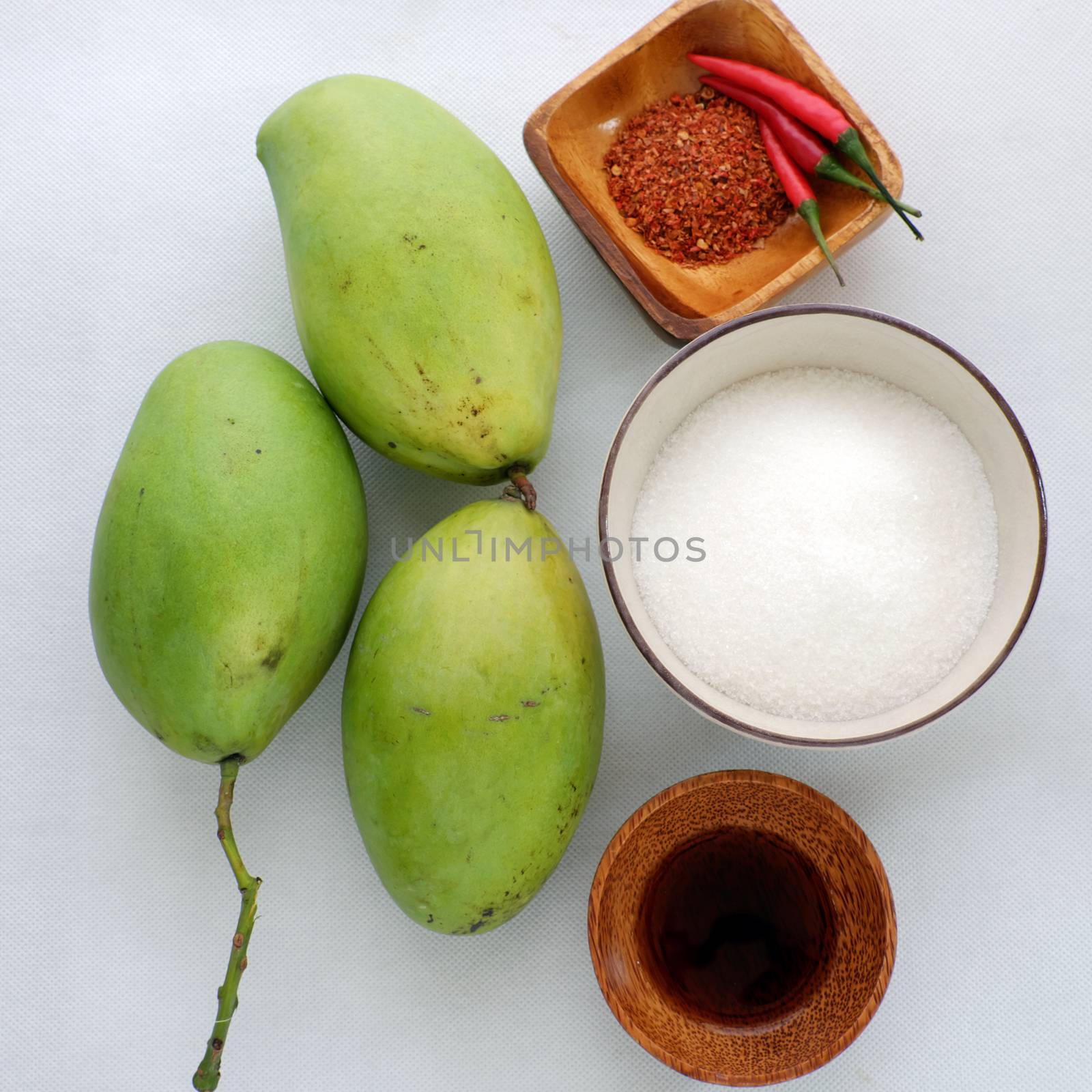 Vietnamese fruit, green mango cut in slice, a popular tropical fruit, rich vitamin A, vitamin C, collagen, good for health and impulse calcium absorption