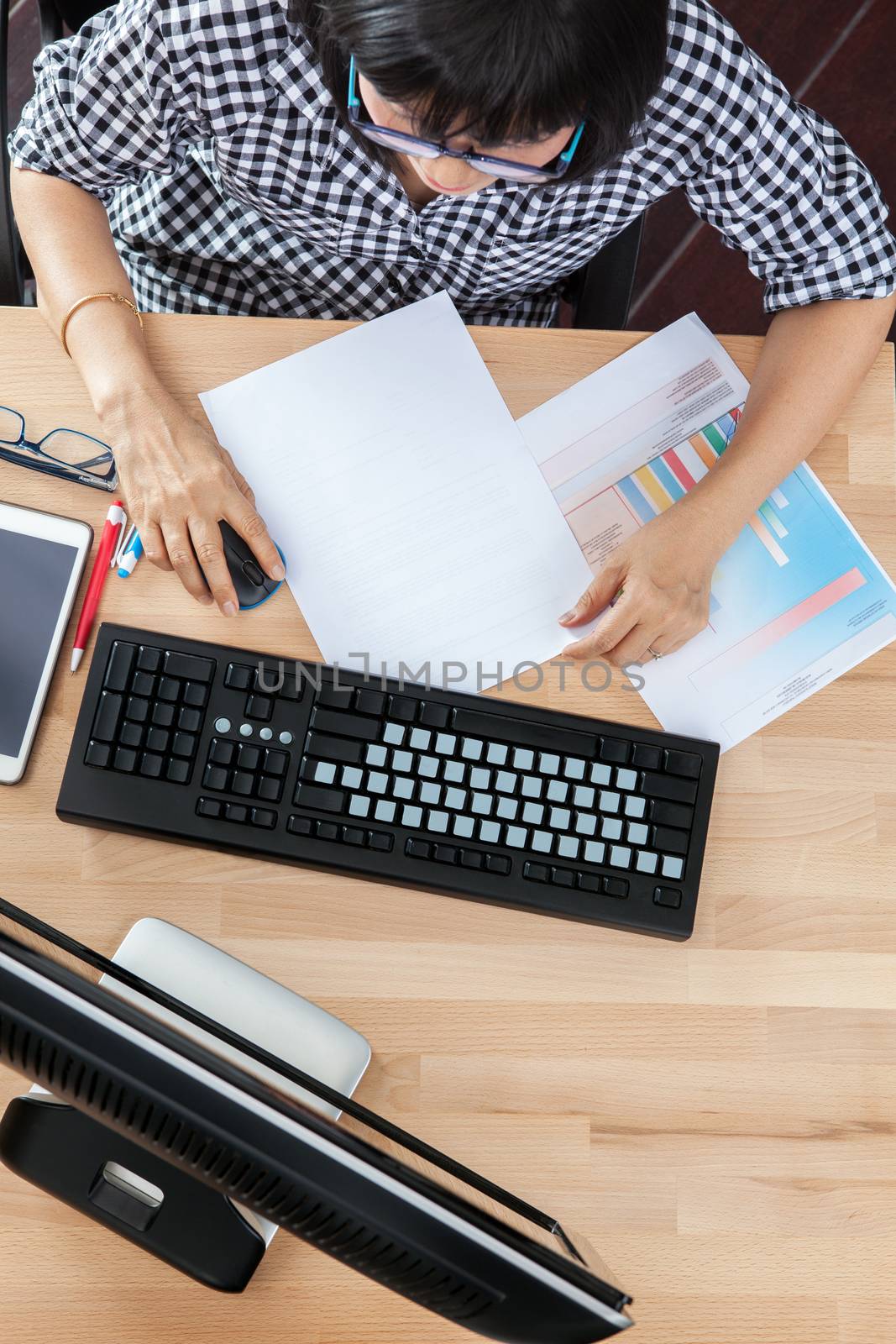 top view of working woman computing table in office life theme by khunaspix