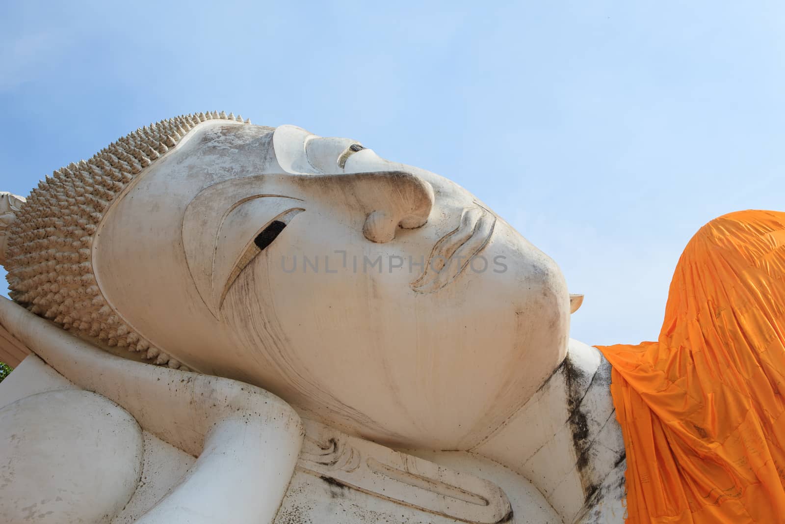 face of sleeping buddha statue in wat khun-inthapramoon temple Angthong Province central of thailand