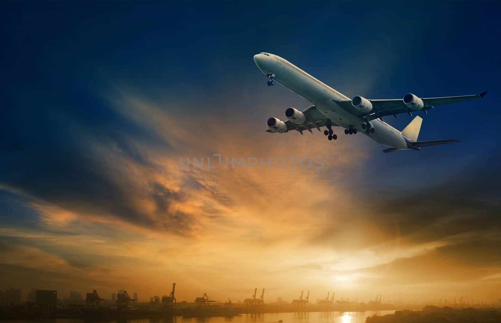 passenger plane flying on beautiful  dusky sky 