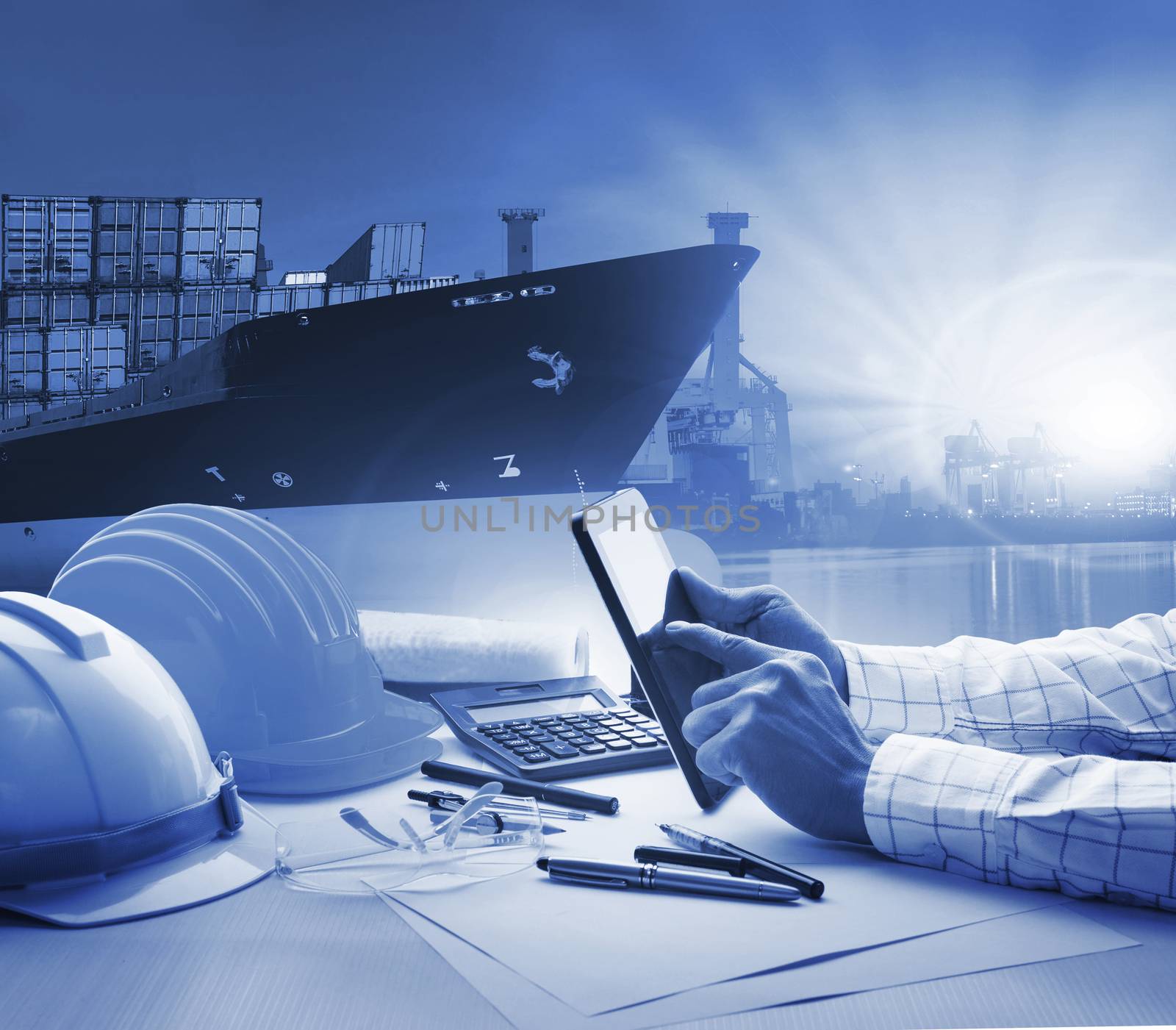 hand of working man in shipping ,logistic freigh cargo transport business blue theme