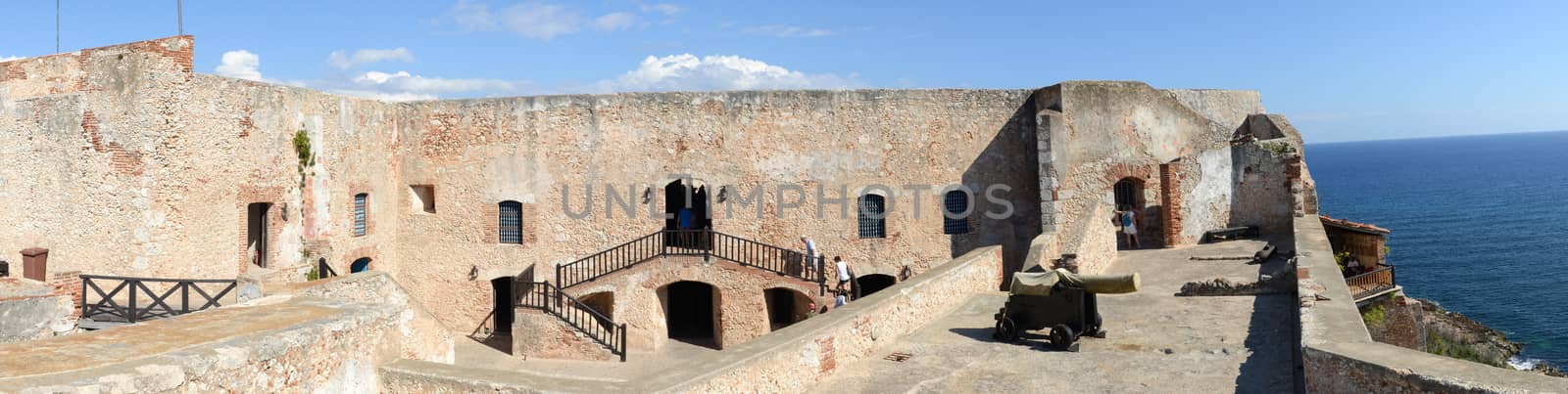 Santiago, Cuba - 14 january 2016: people visiting on walking El Morro castle at Santiago de Cuba, Cuba