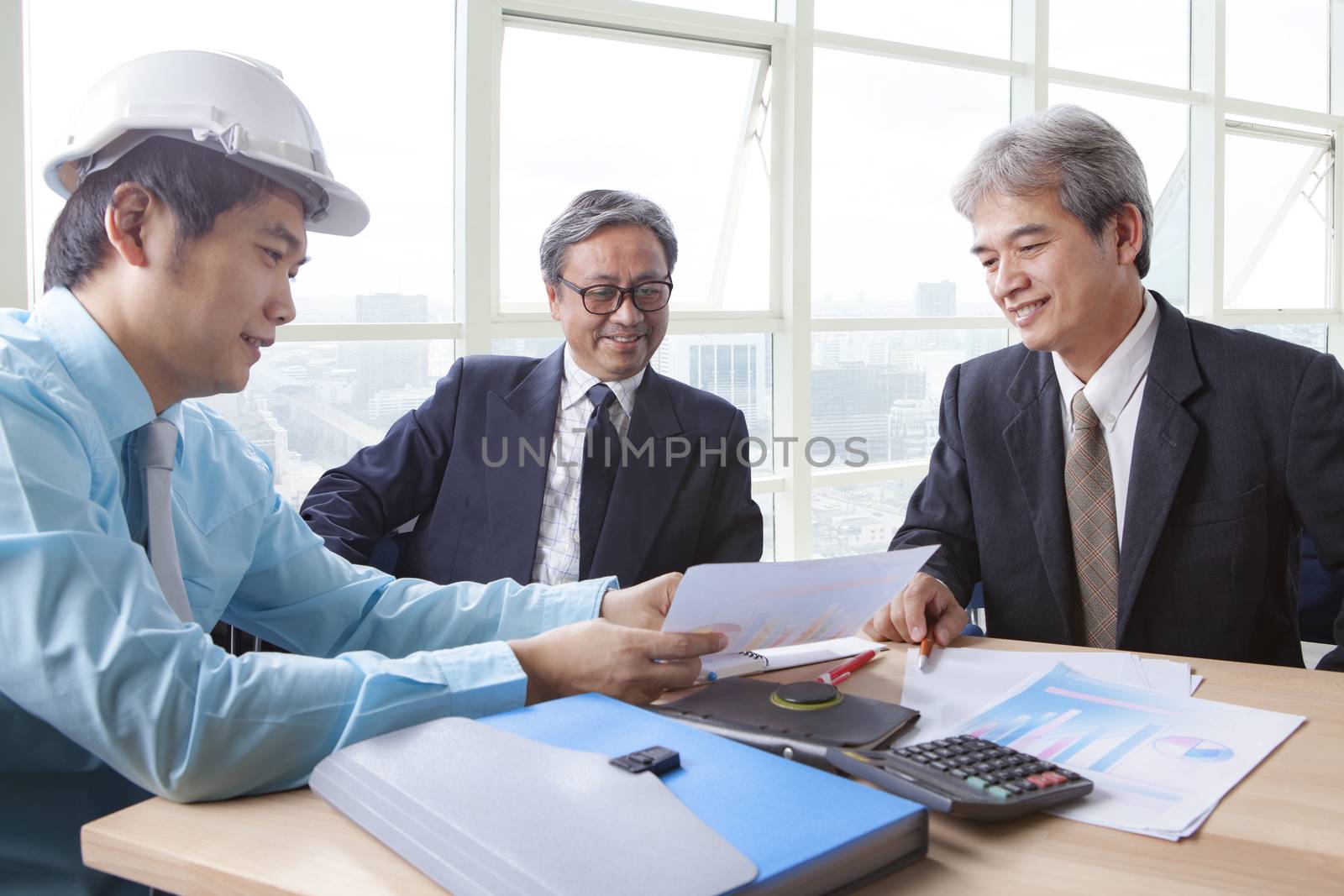 team of young and senior engineering man project meeting in working office for project discussion