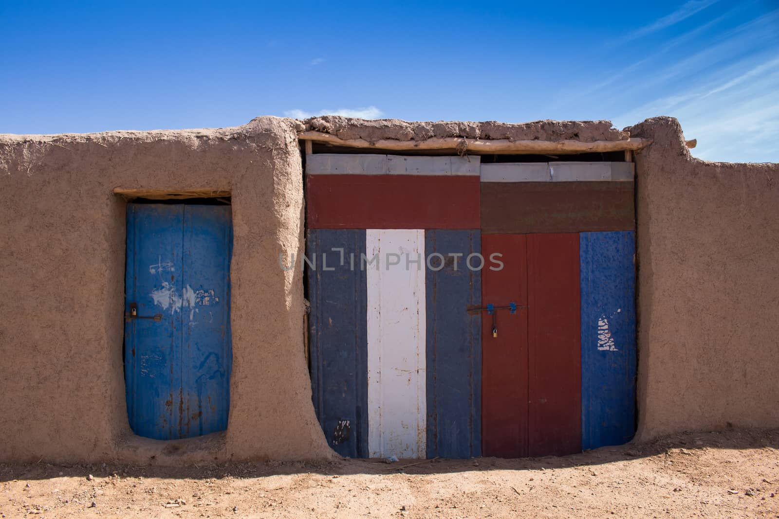 Doors of a traditional house, Merzouga, Morocco by YassminPhoto