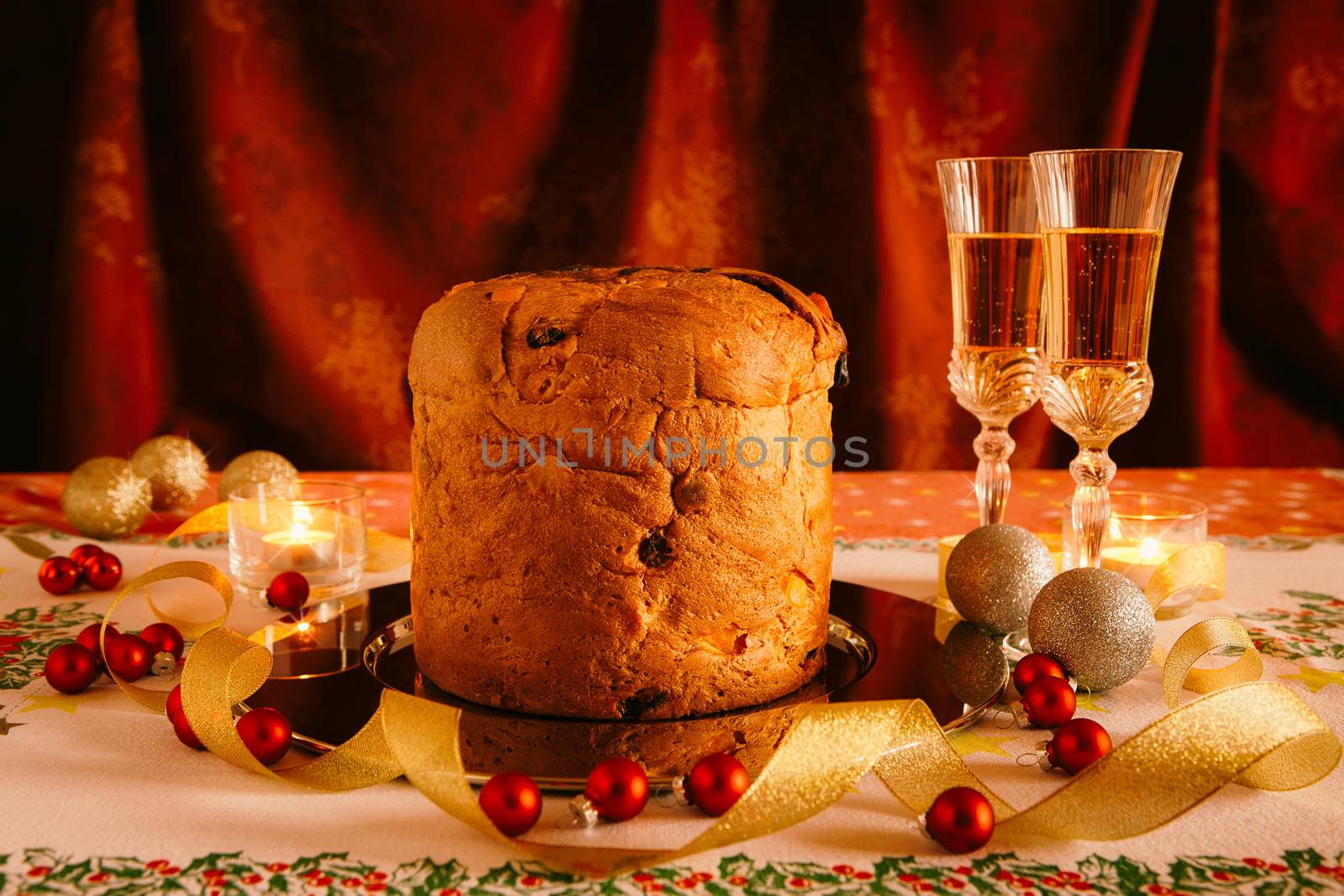 Christmas cake and sparkling wine with Christmas decorations