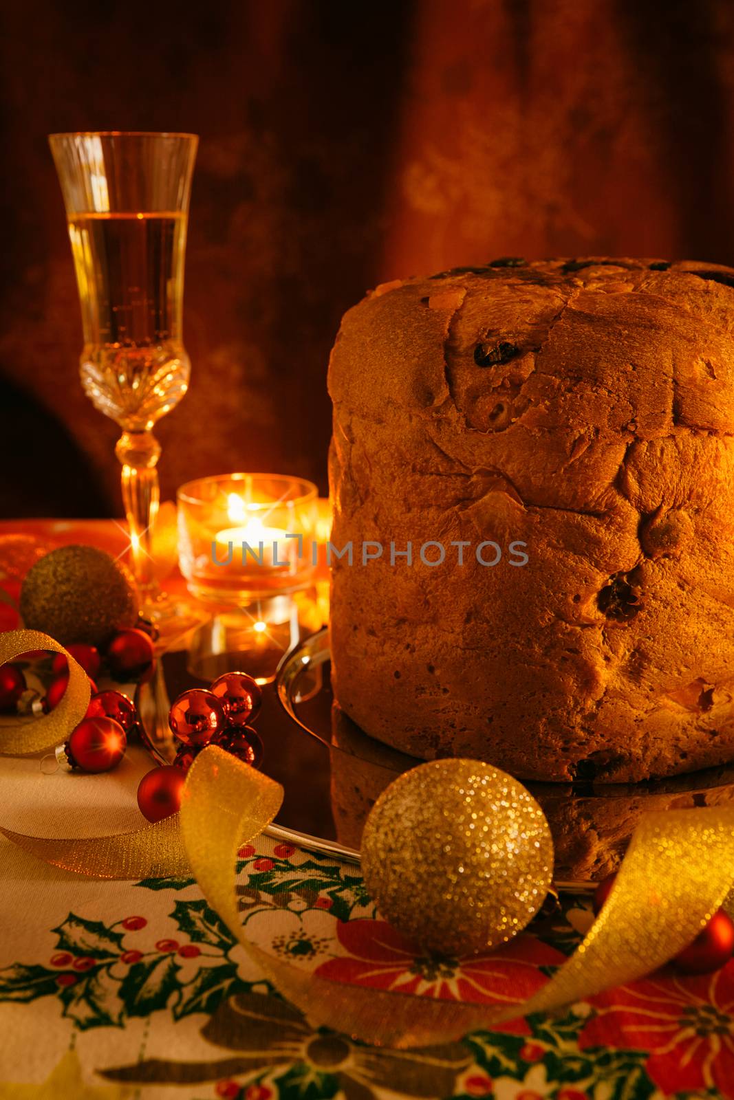 Italian panettone and sparkling wine with Christmas decorations