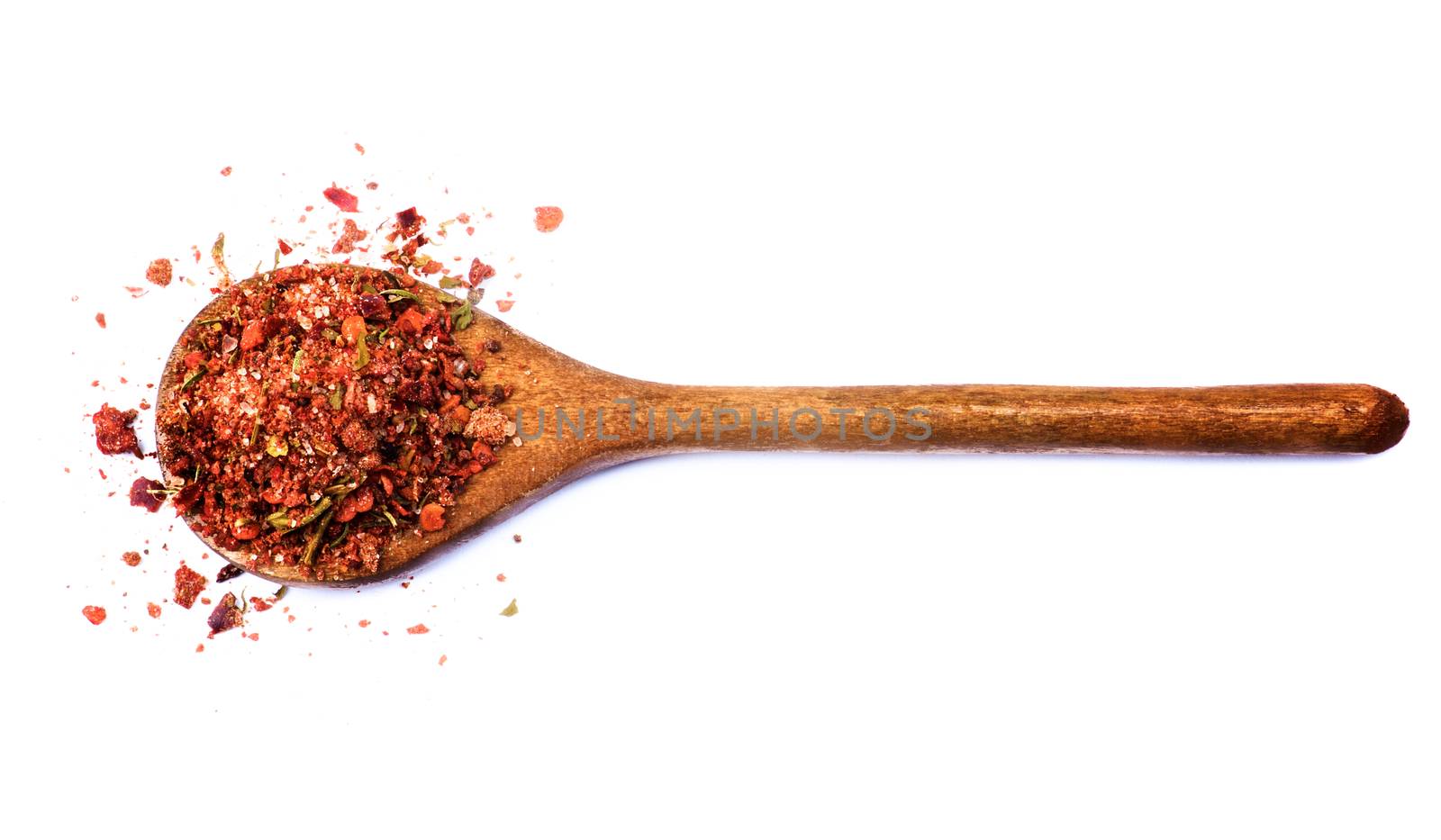 Homemade Dried and Crushed Chili Pepper with Herb and Spices in Wooden Spoon isolated on White background