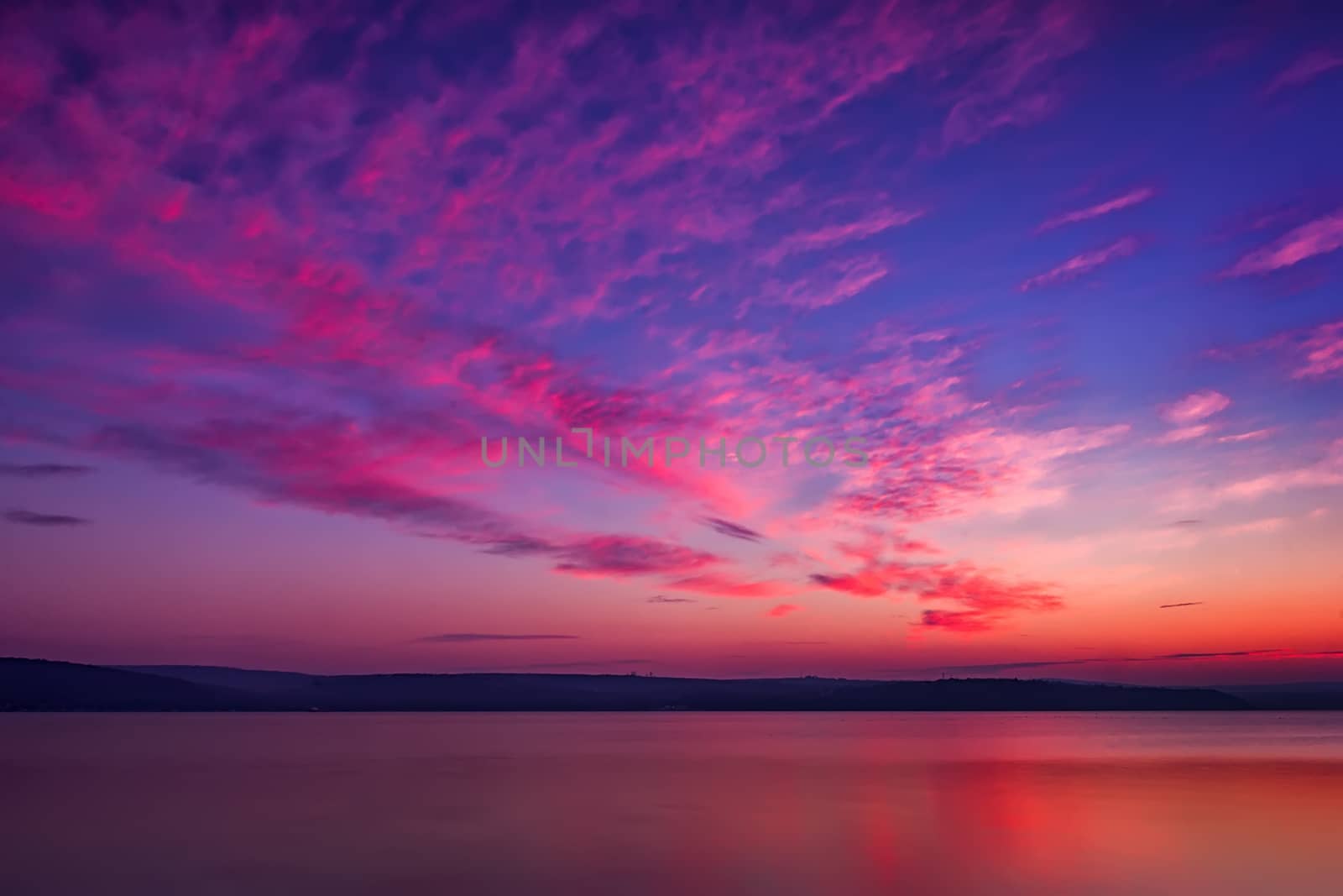 Superb sunset with water reflection