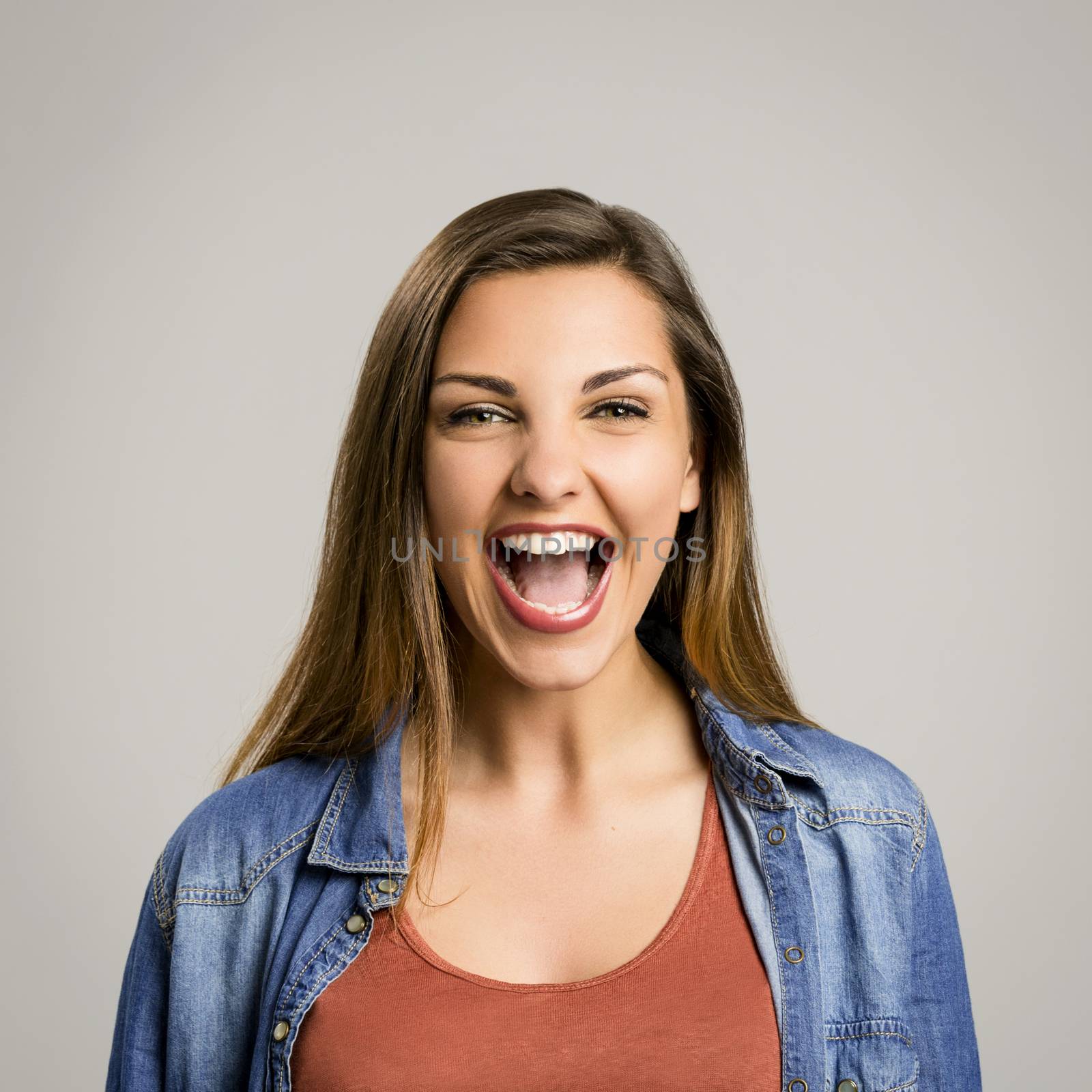 Happy woman laughing by Iko