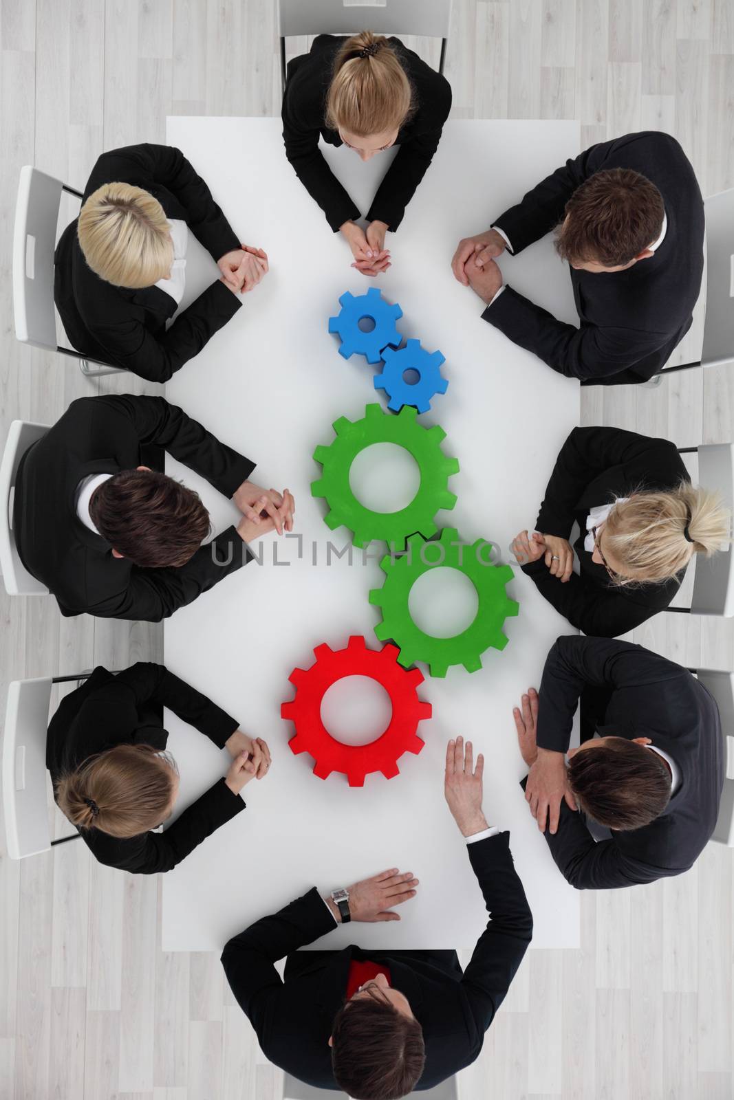 Business team and cogs by ALotOfPeople