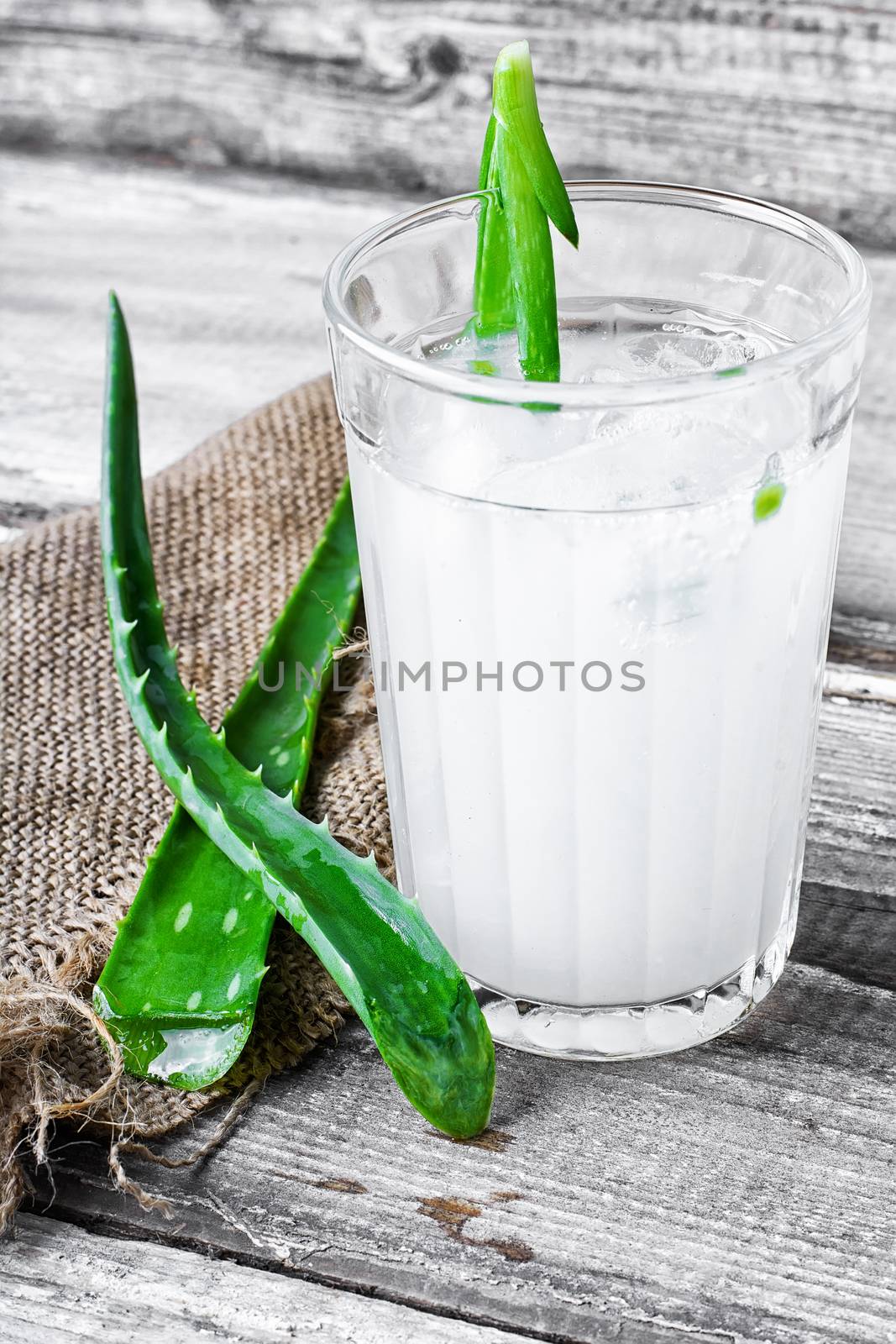glass of medicinal drink sap from aloe leaf