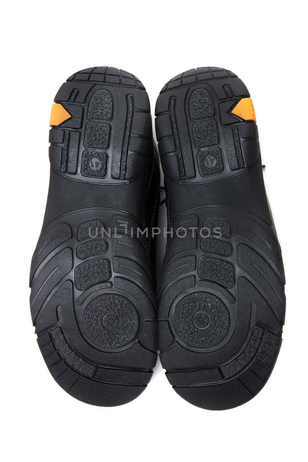 Close up view of modern black man boots isolated on a white background.