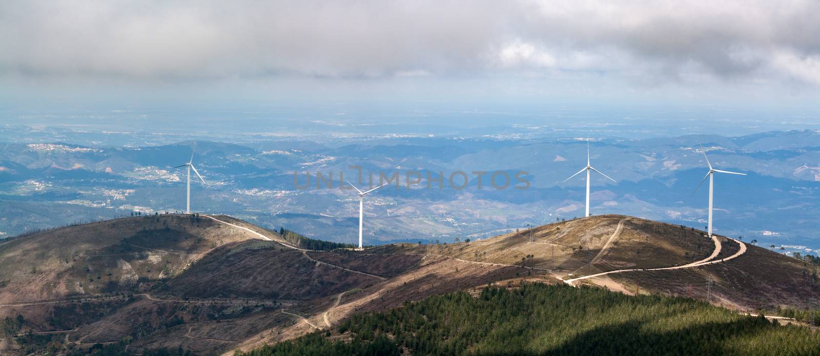 Eolic wind generators on top of hills in Portugal.