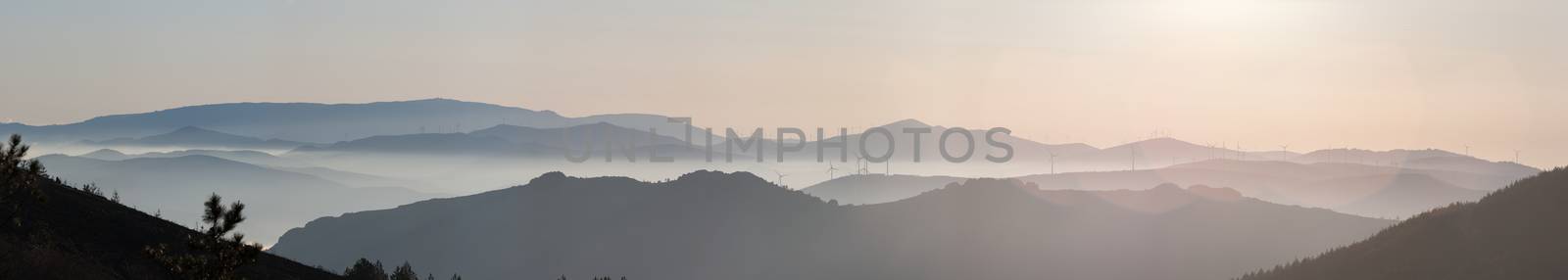Misty hills in the morning near Lousa region, Portugal.