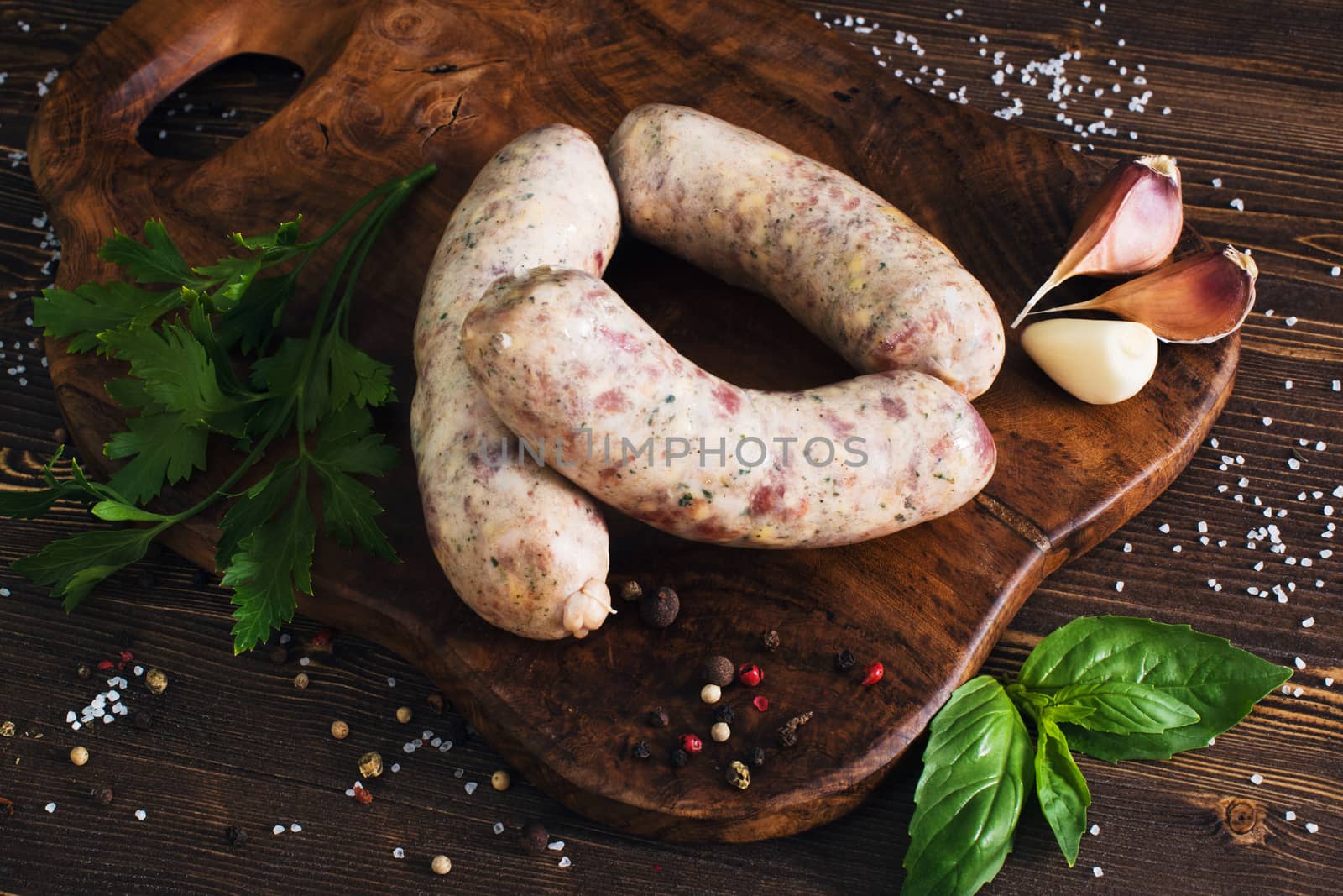 Raw sausages with garlic and parsley by kzen