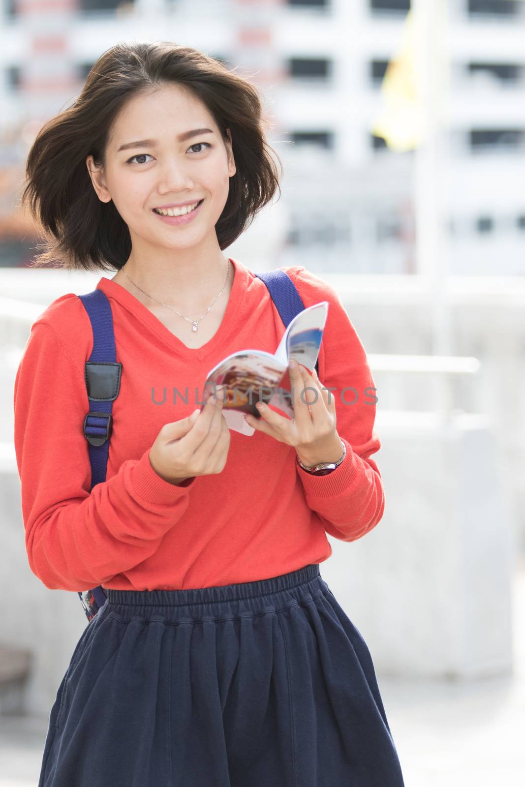 attractive young asian student traveling outdoor smiling face with happiness emotion