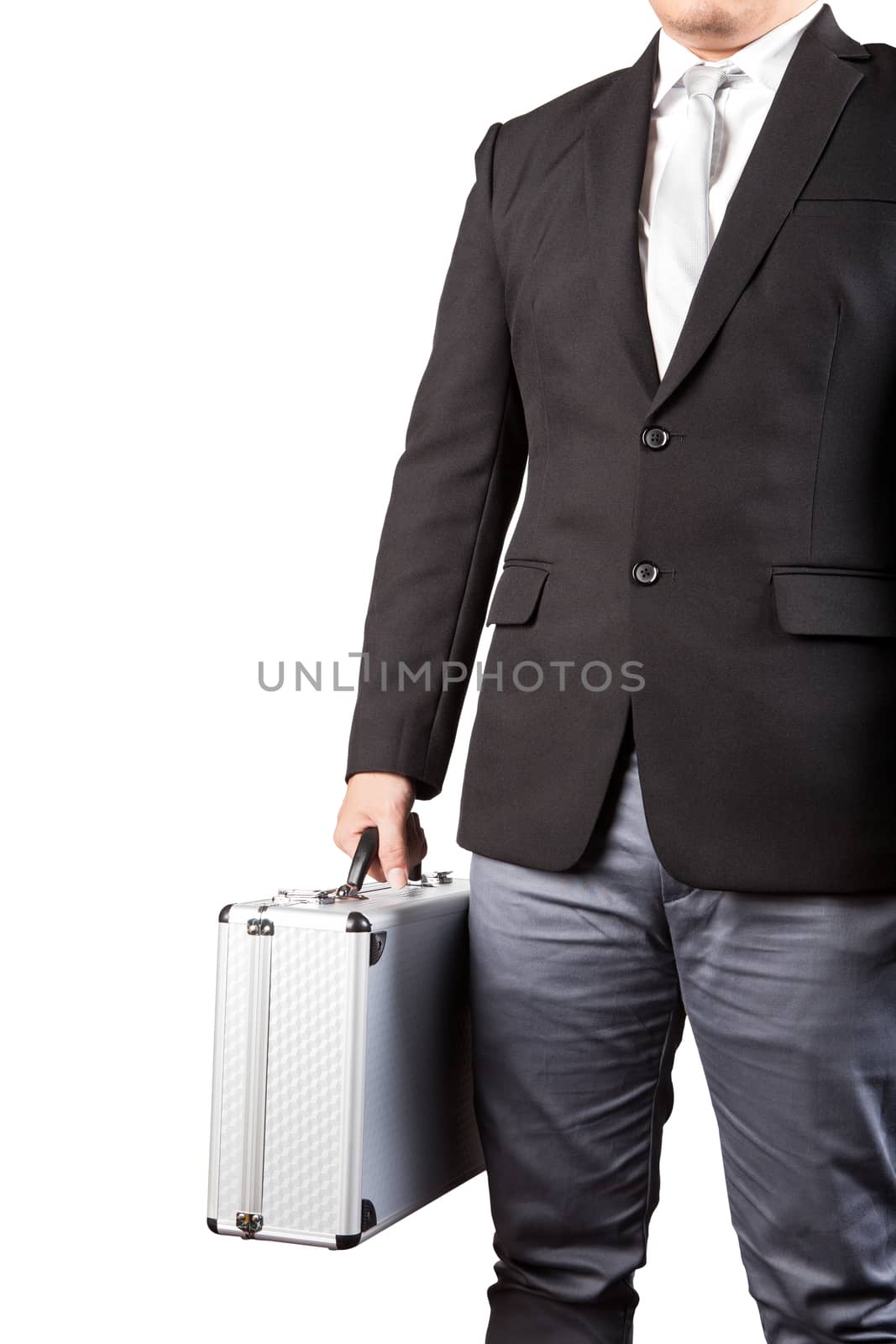 young business man holding stong metal suitcase isolated white background