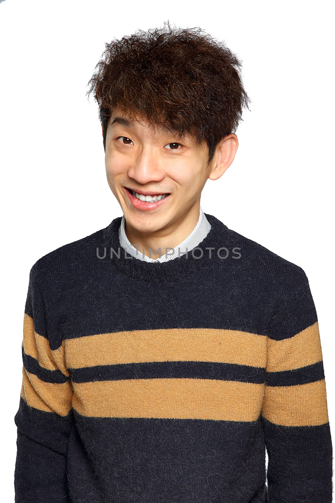 Young Asian man close up smile shot by cozyta