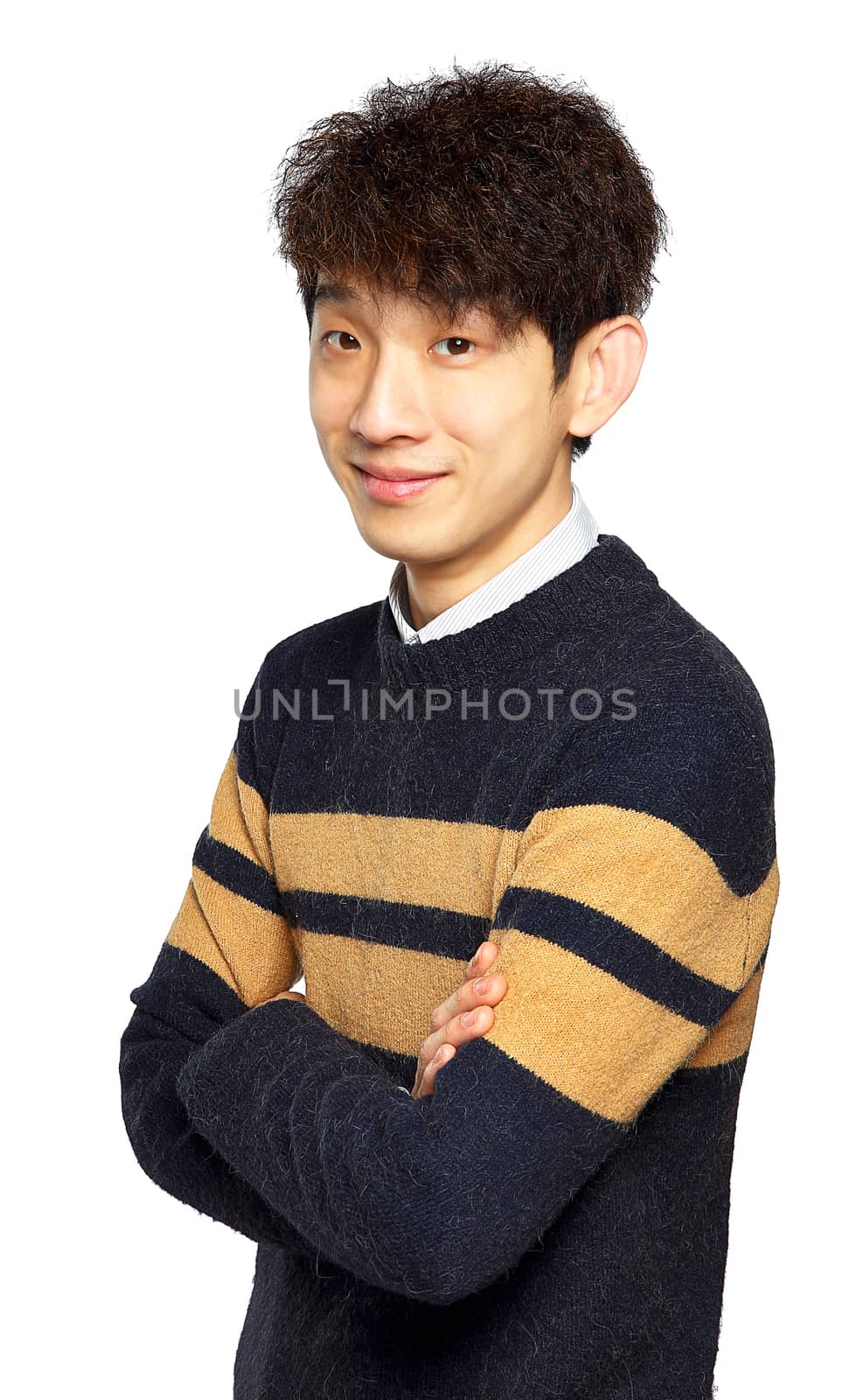 Portrait of happy asian man with arms folded