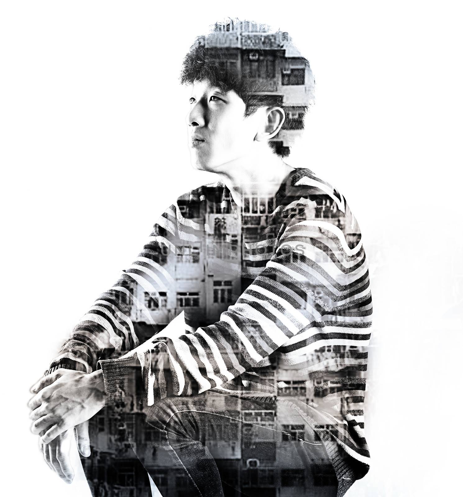 double exposure asian man and city buildings by cozyta