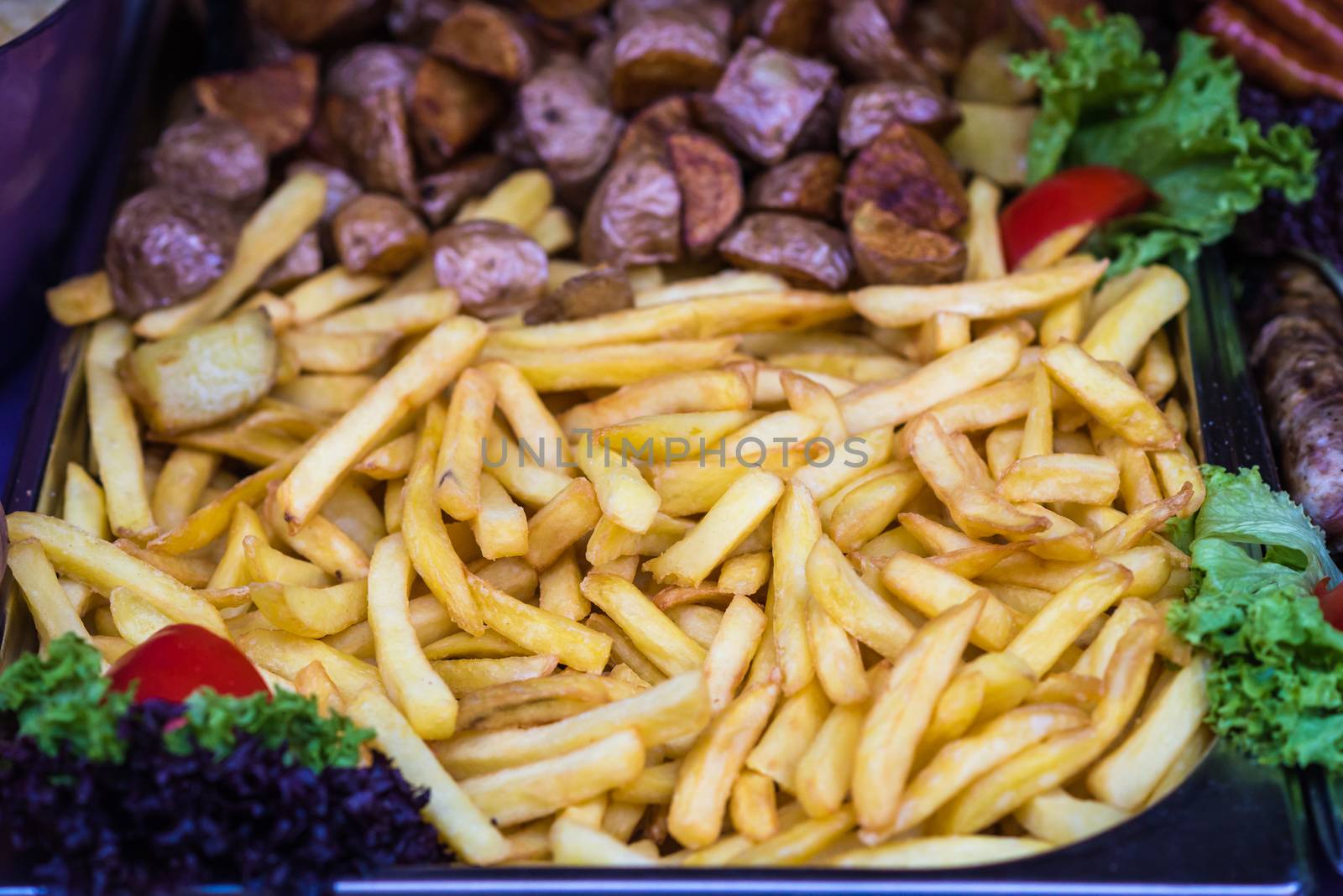 delicious crispy french fries at the counter