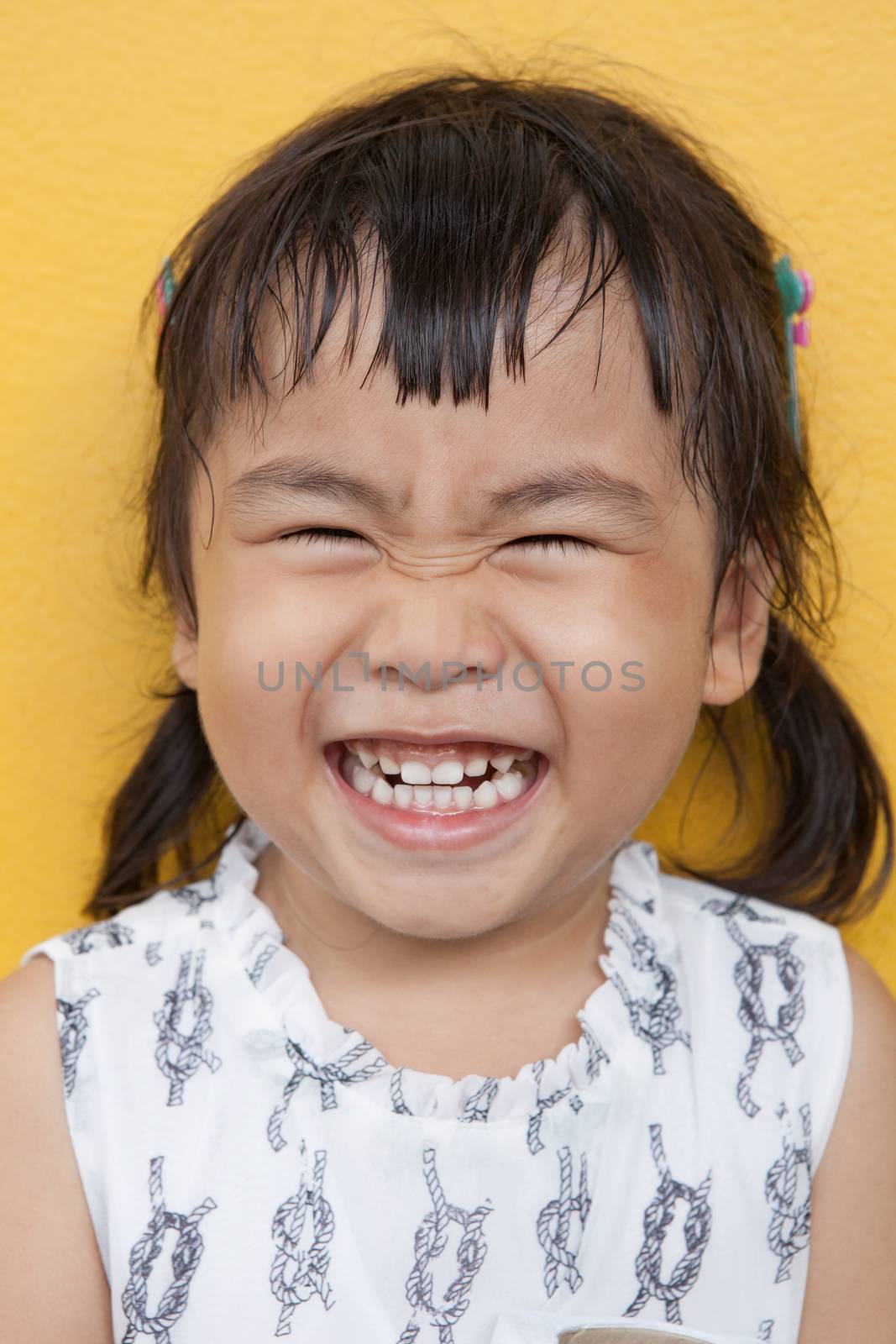 face of asian 4s year old laughing show good healthy tooth ,happy emotion