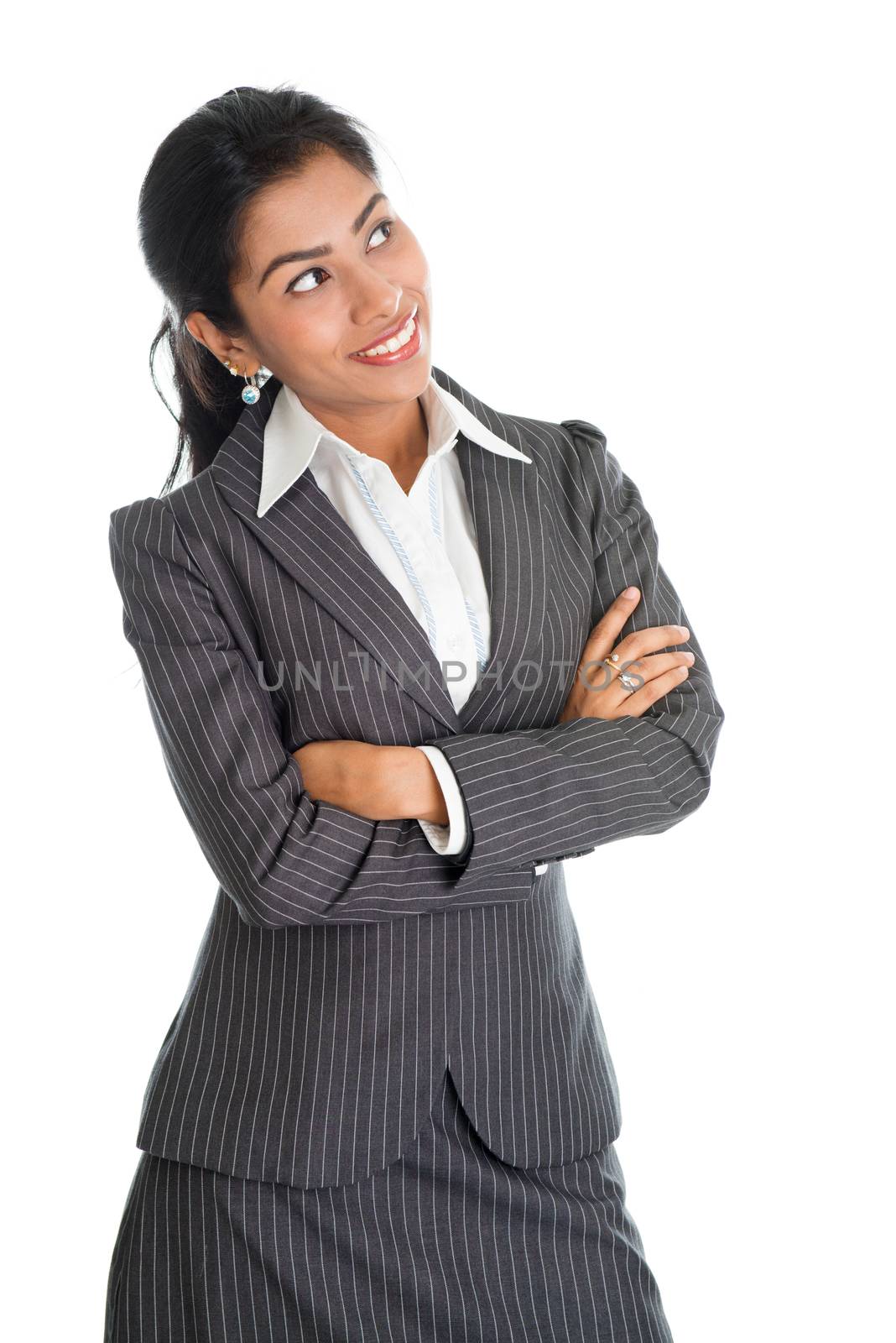 Portrait of black business woman in formalwear arms crossed and smiling, looking away, isolated on white background.