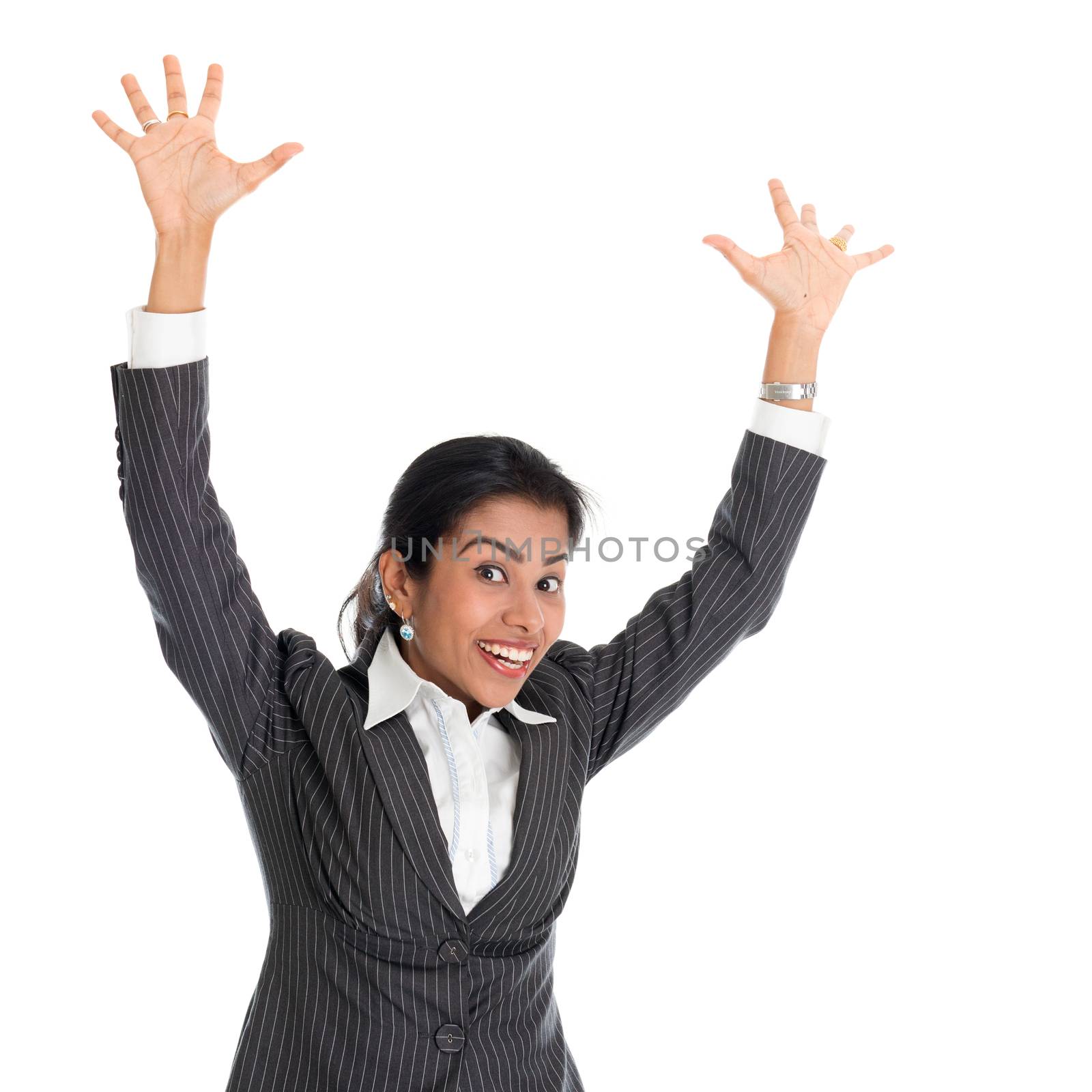 Portrait of black business woman in formalwear arms raised and smiling, isolated on white background.