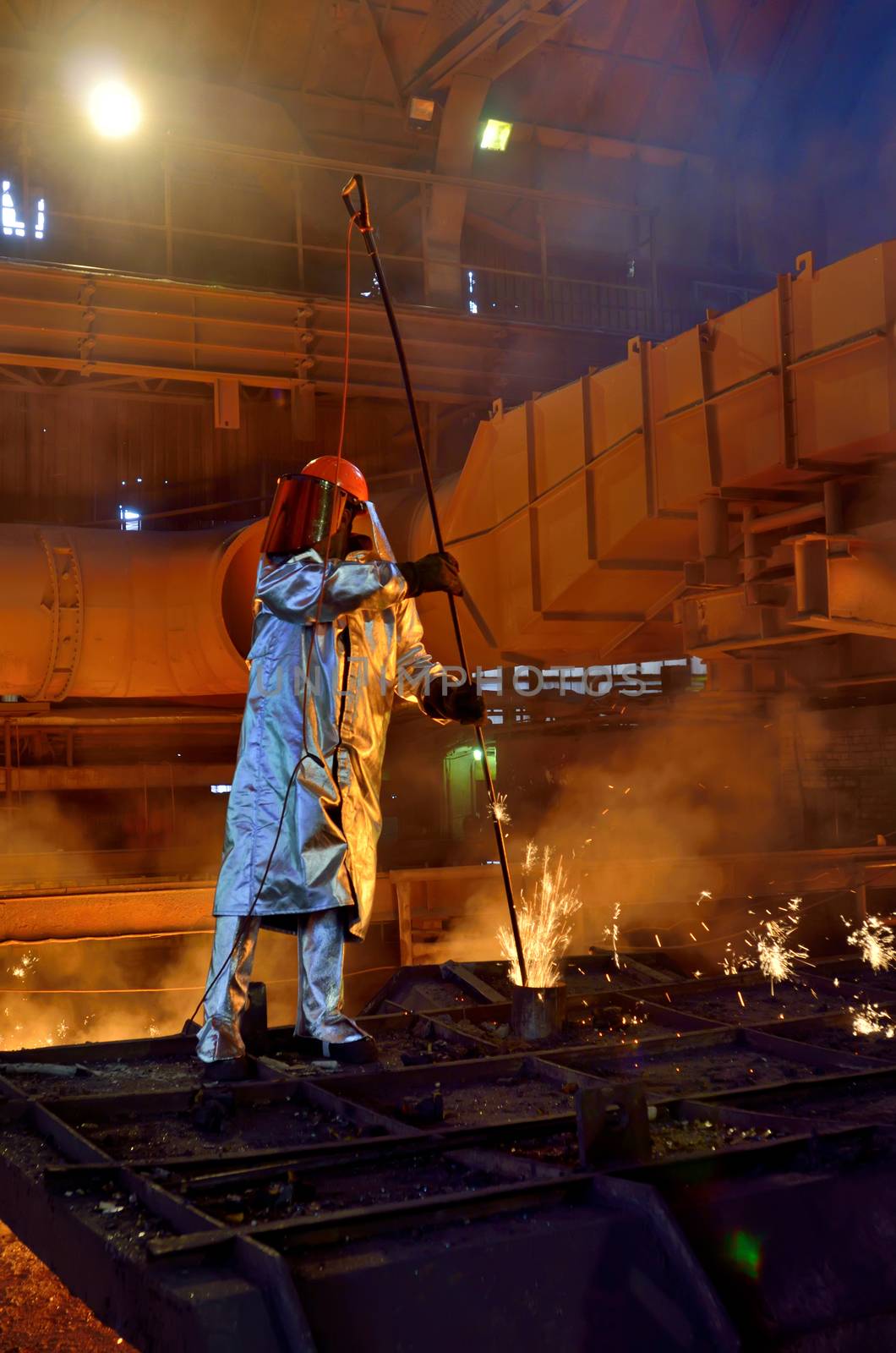 Steel worker inside of steel plant