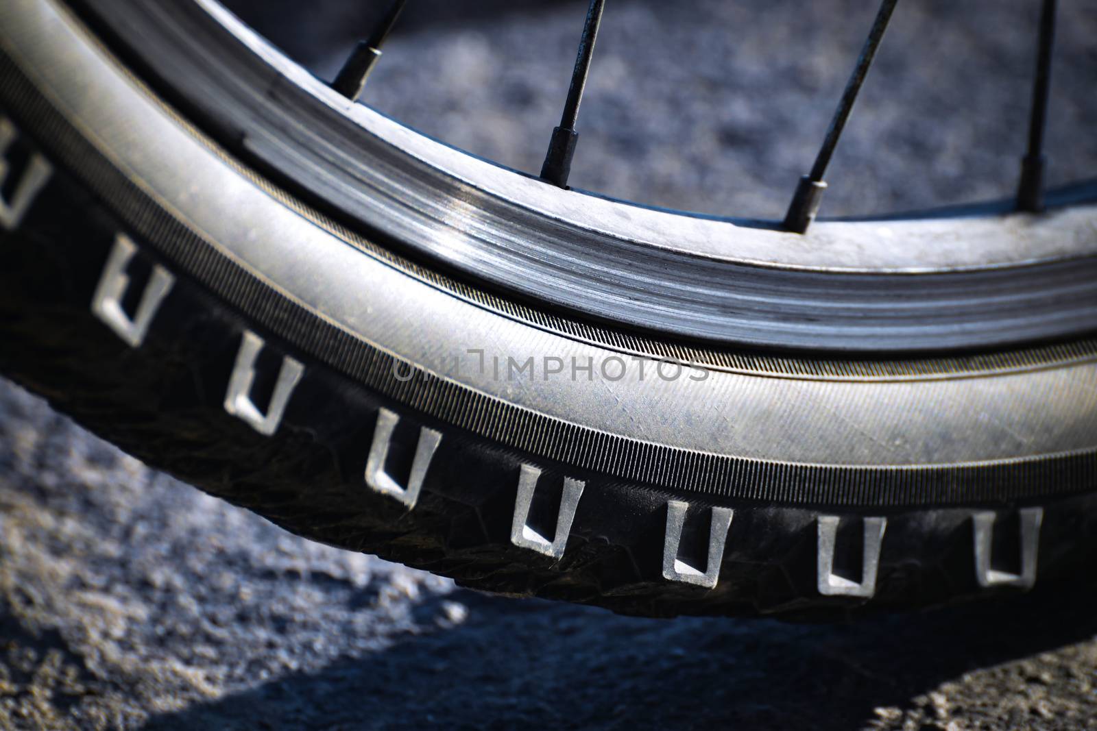 detail wheel mountain bike with shadow underneath