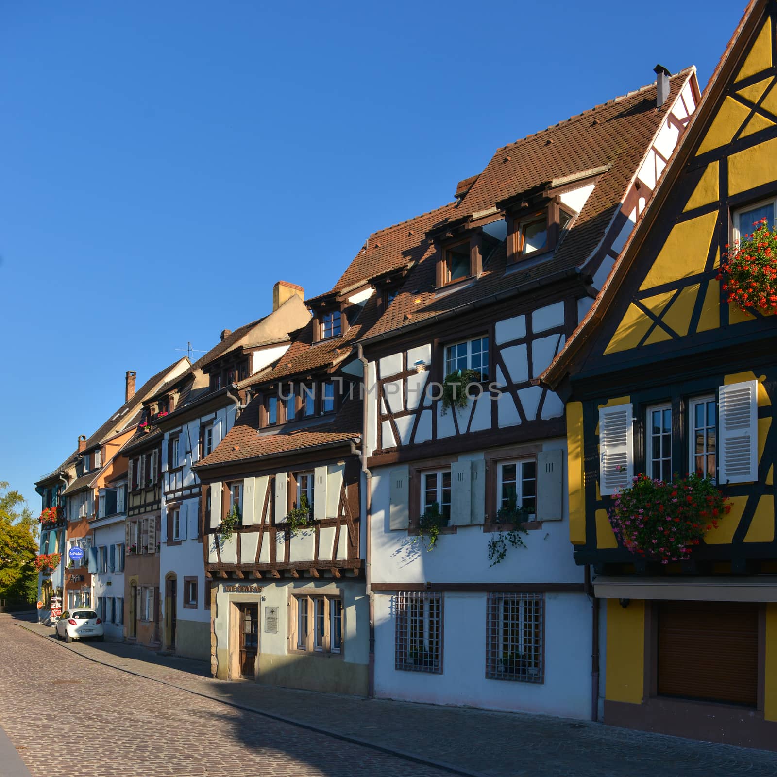 Colorful traditional french houses on the side of river Lauch in Petite Venise, Colmar, France