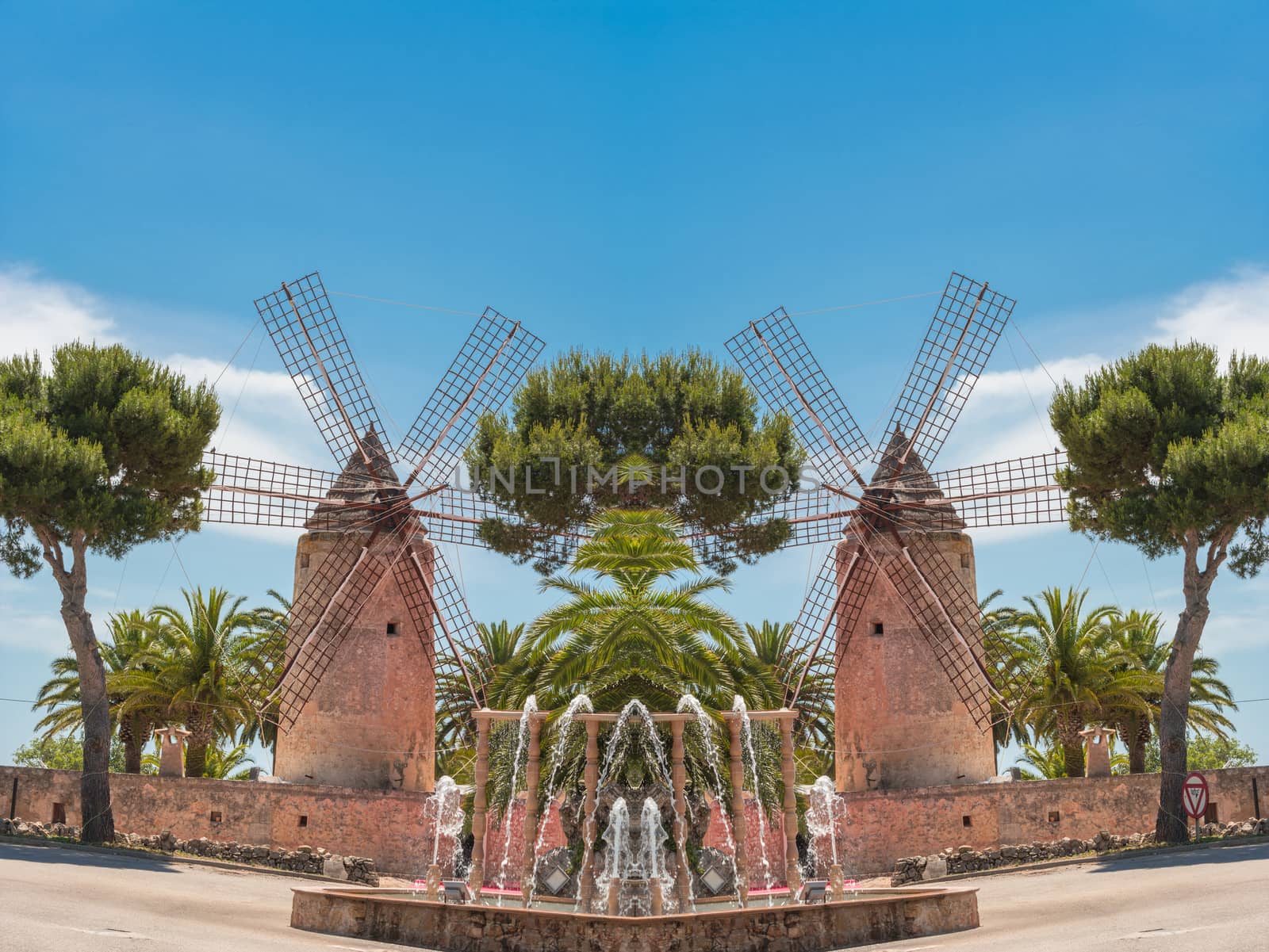 Photomontage, two old historic windmill at a country estate in Mallorca (Spain)