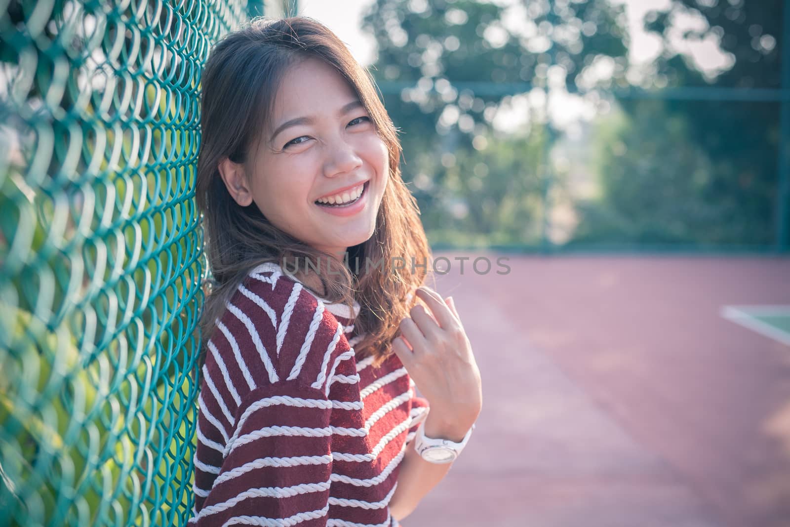 smiling face happiness emotion of asian younger woman with no make up face