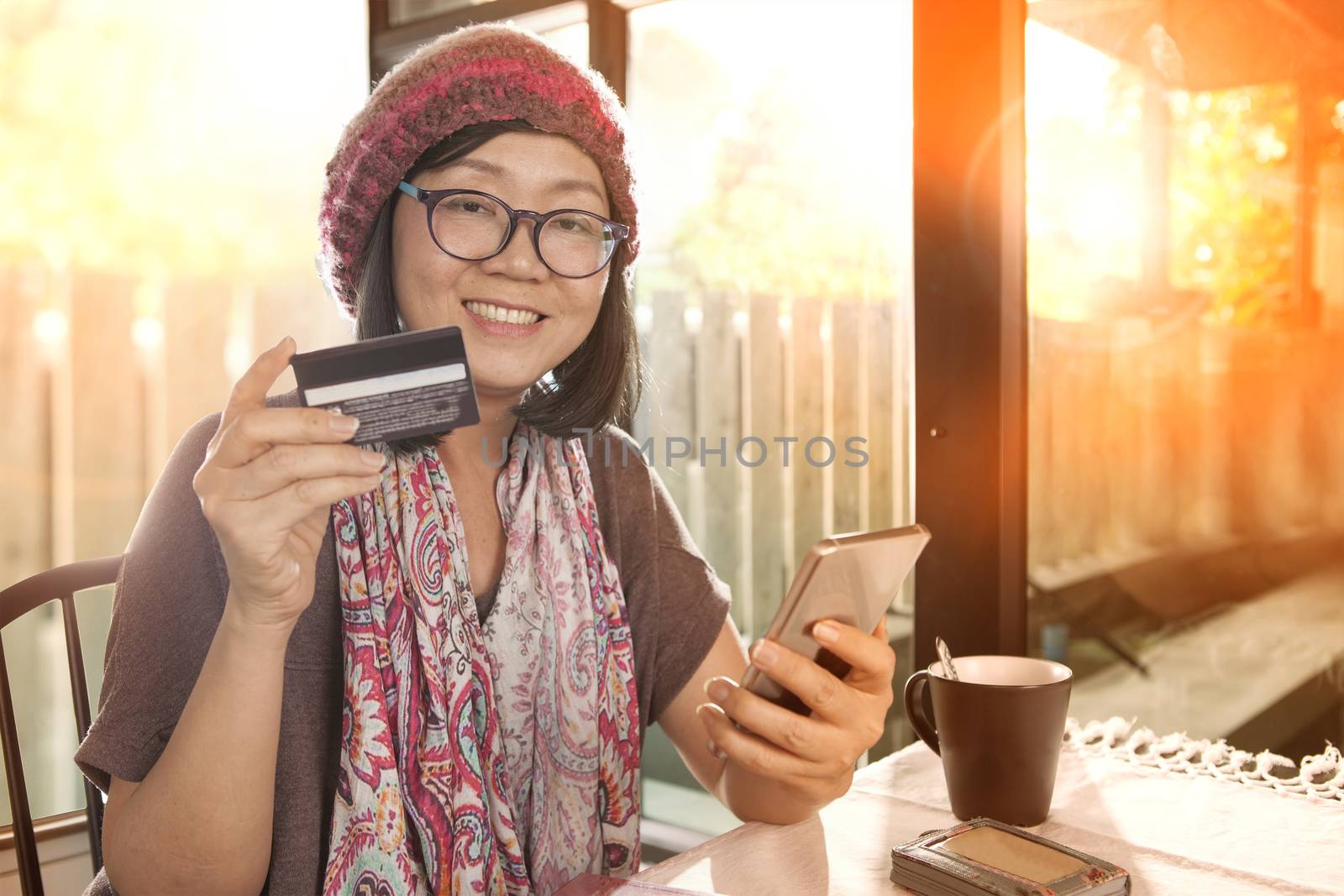 happiness emotion of asian woman with credit card in hand use for people modern lifestyle shopping on line 