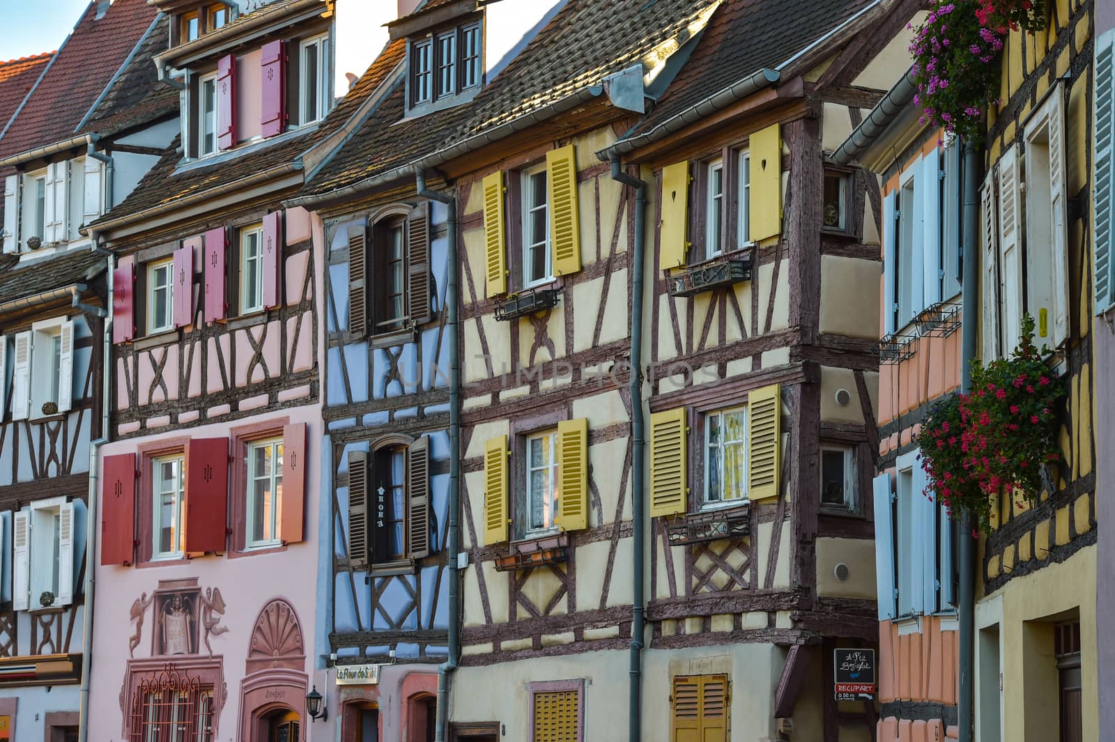 Colorful traditional french houses on the side of river Lauch in Petite Venise, Colmar, France