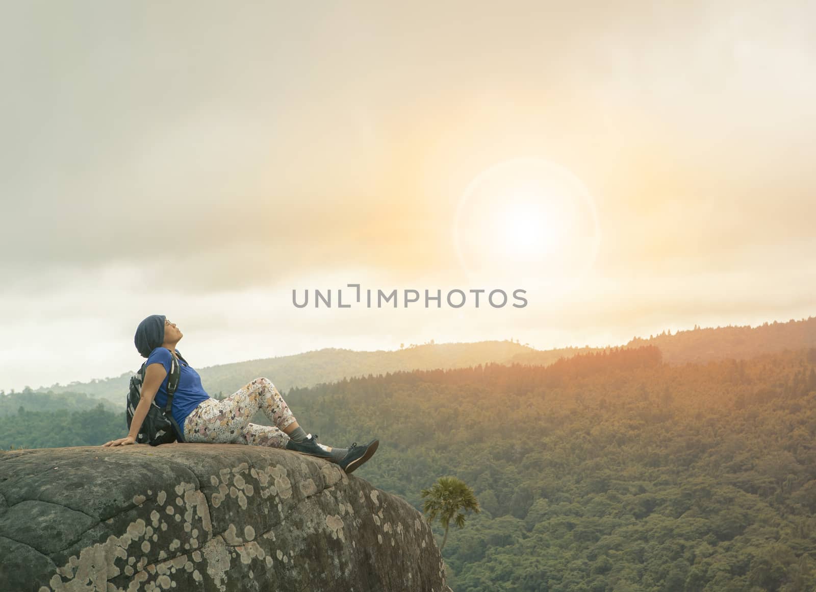 traveling woman relaxing trekking on rock cliff use for people leisure lifestyle