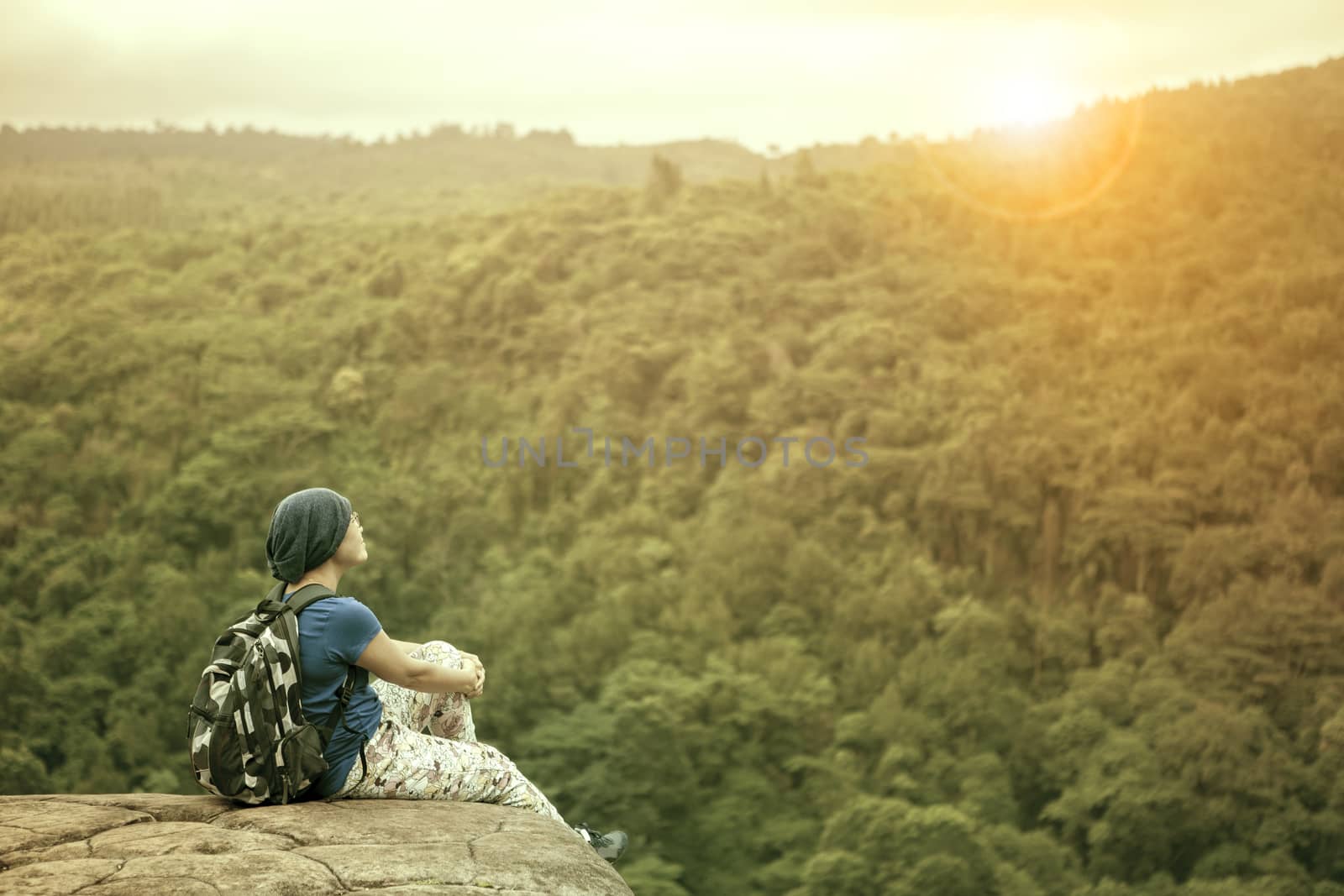 traveling woman relaxing trekking on rock cliff use for people leisure lifestyle