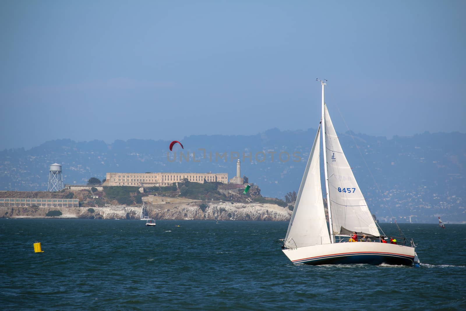 SAN FRANCISCO, USA - MAI 23, 2015: yacht sail in front of Alcatraz prison island by evolutionnow