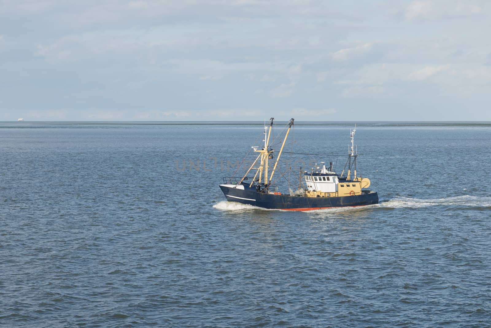 Fishing boat on the Wadden Sea 
 by Tofotografie