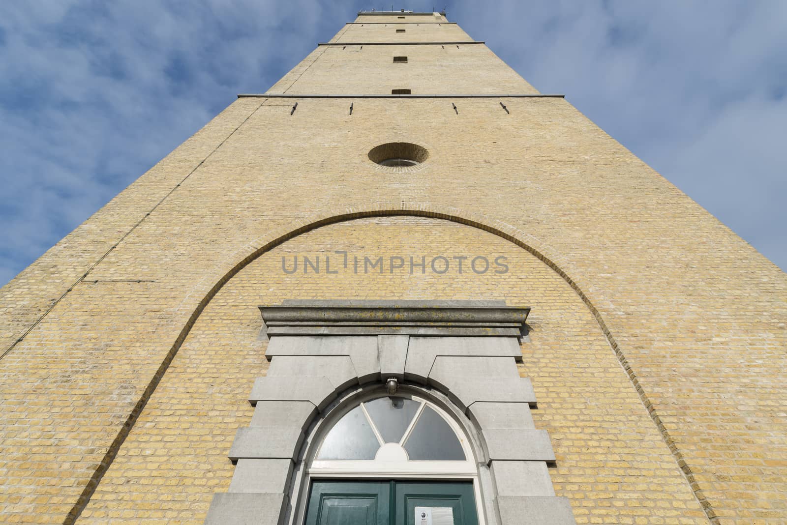 The famous historic lighthouse called the Brandaris in the place West-Terschelling on the North Sea Island of Terschelling in the Netherlands
