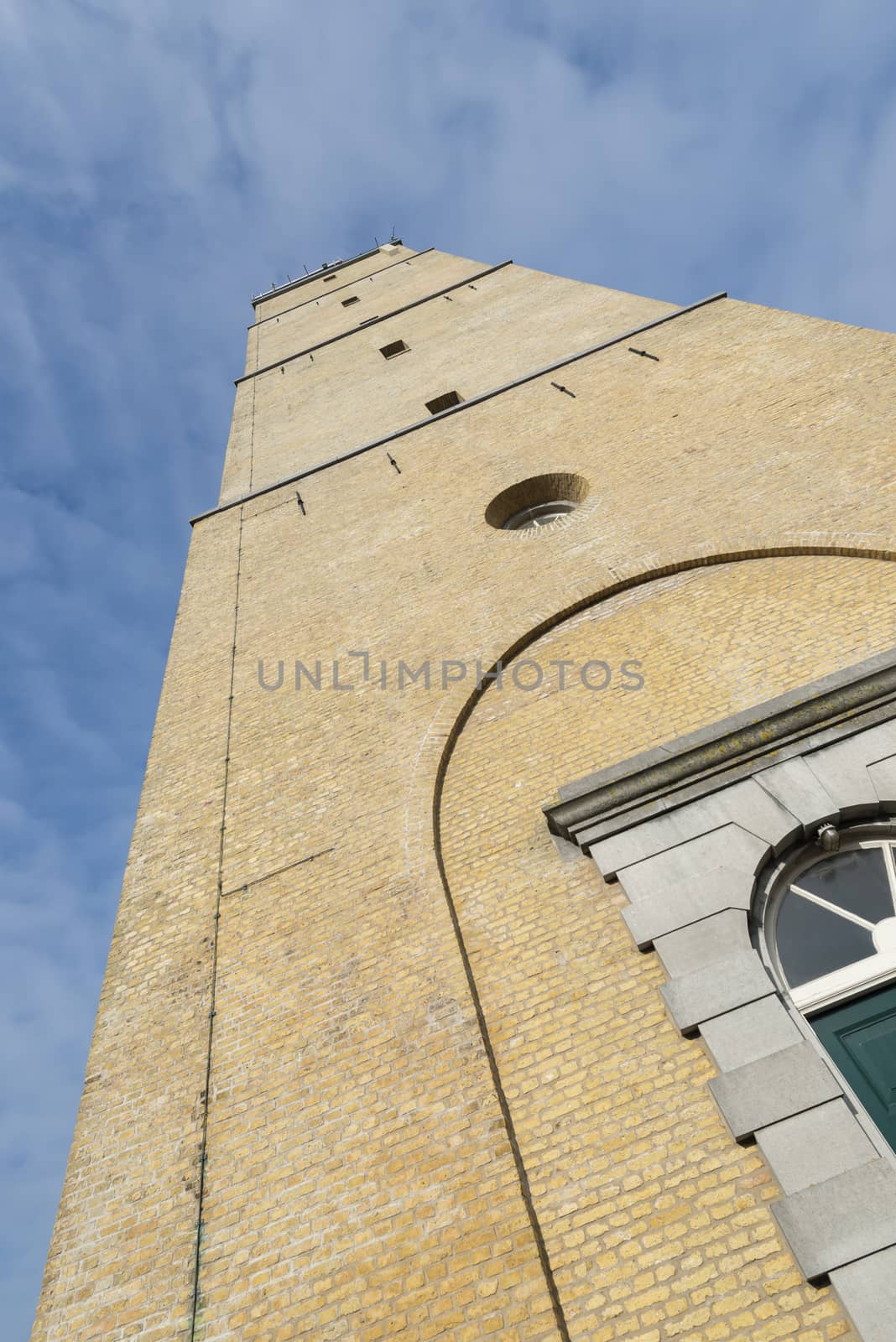 The famous historic lighthouse called the Brandaris in the place West-Terschelling on the North Sea Island of Terschelling in the Netherlands
